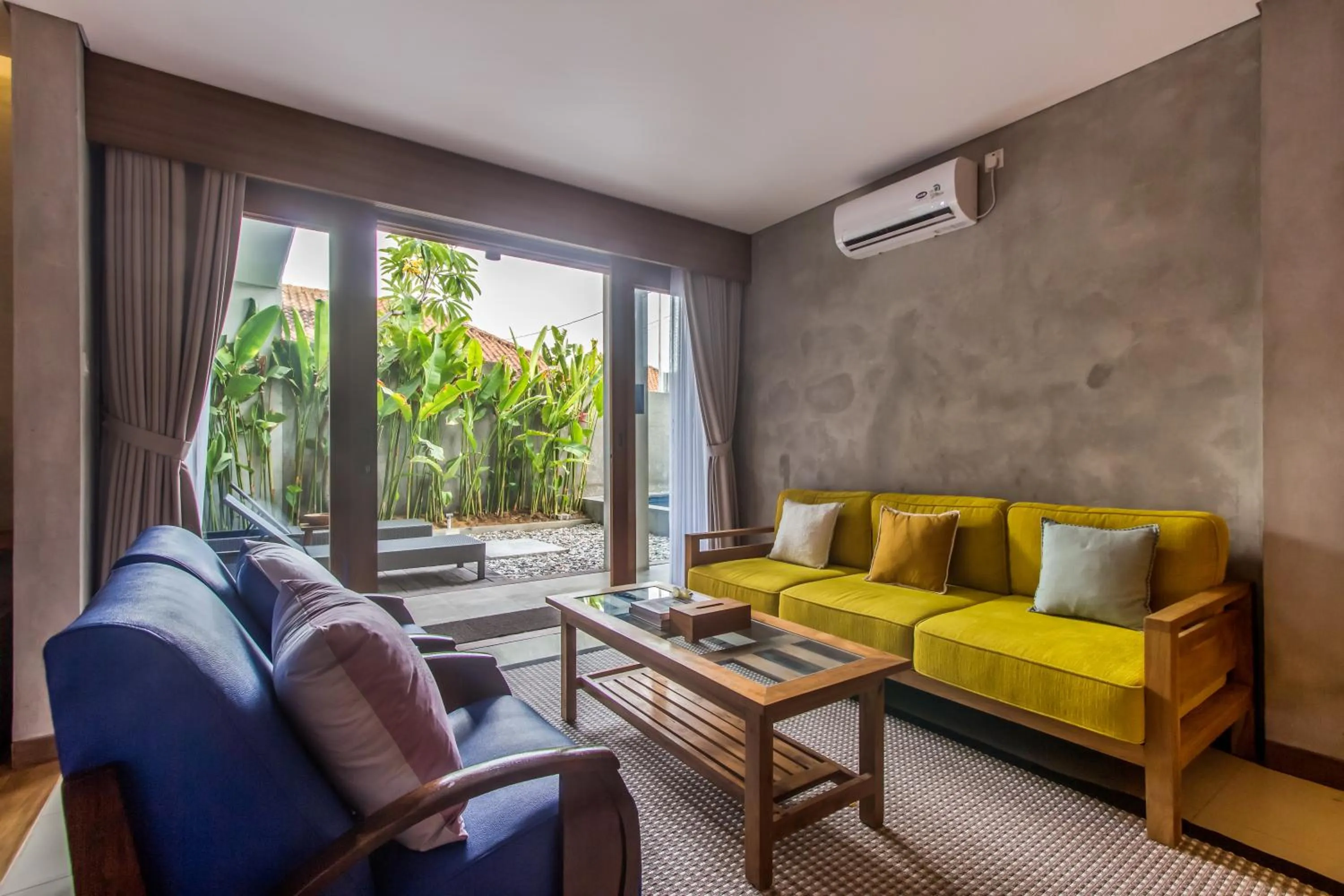 Living room in Kuta Legian Villa by Kamara