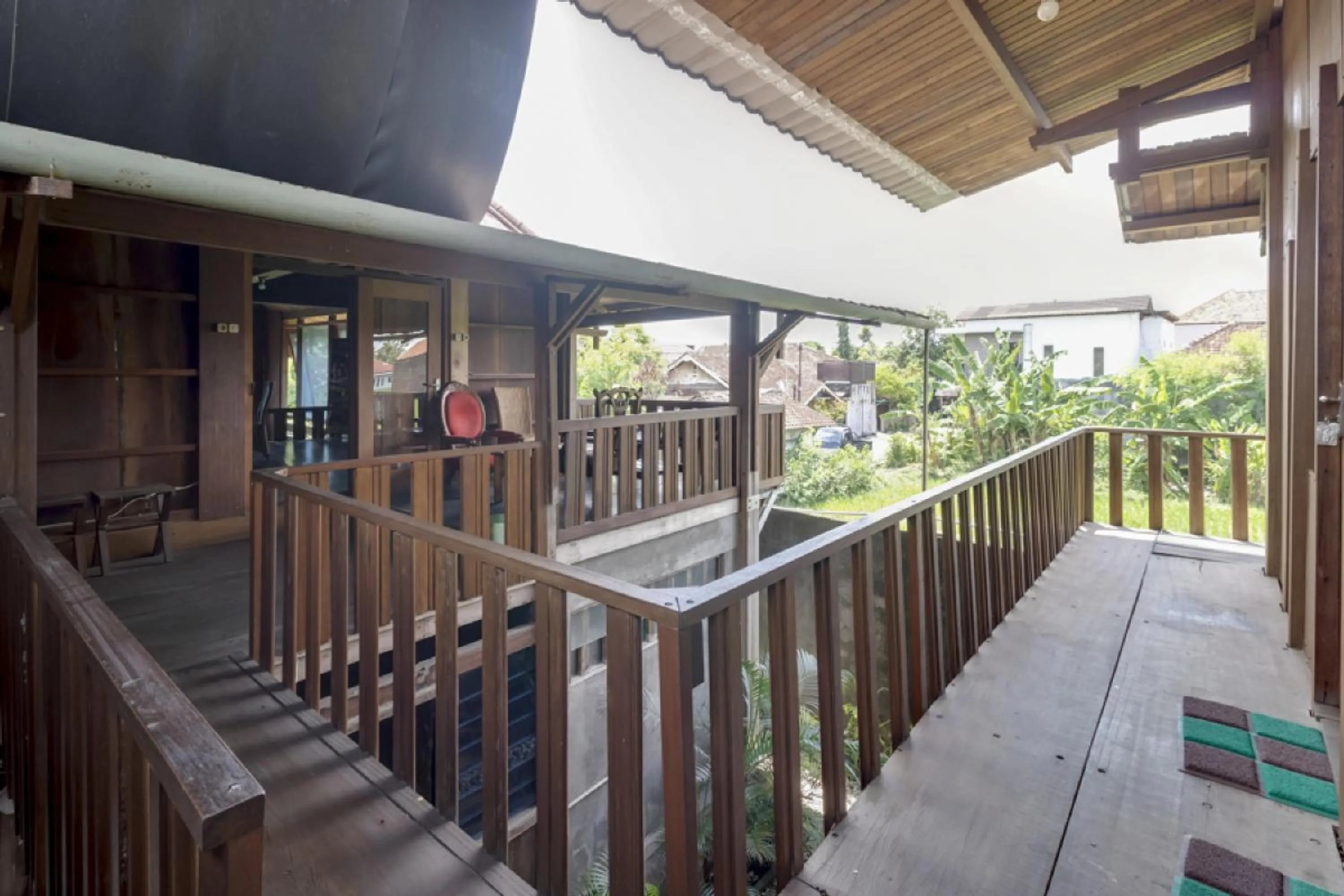 Balcony/Terrace in RedDoorz at Omah Kayu Homestay Yogyakarta