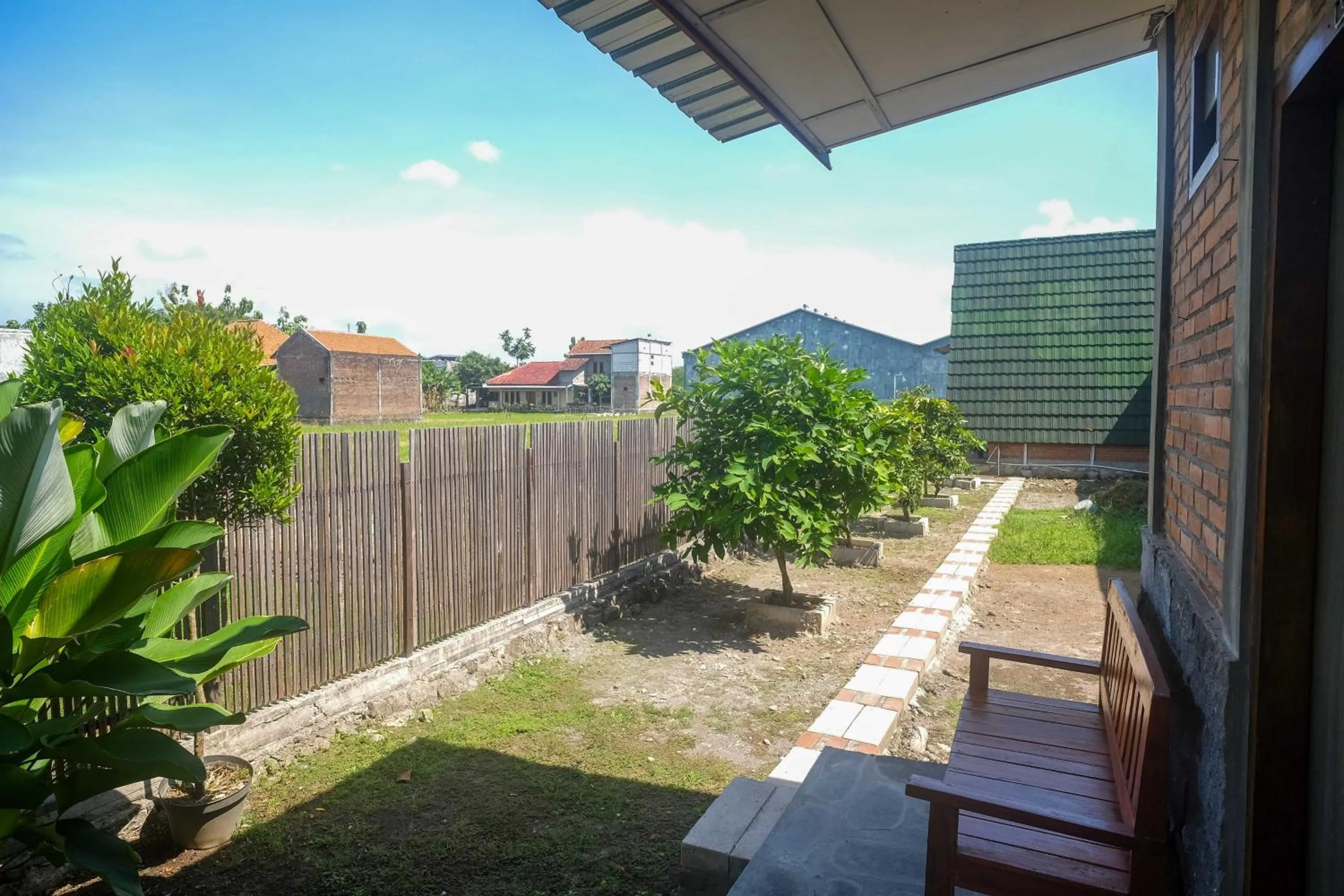 Property building in RedDoorz at Omah Kayu Homestay Yogyakarta