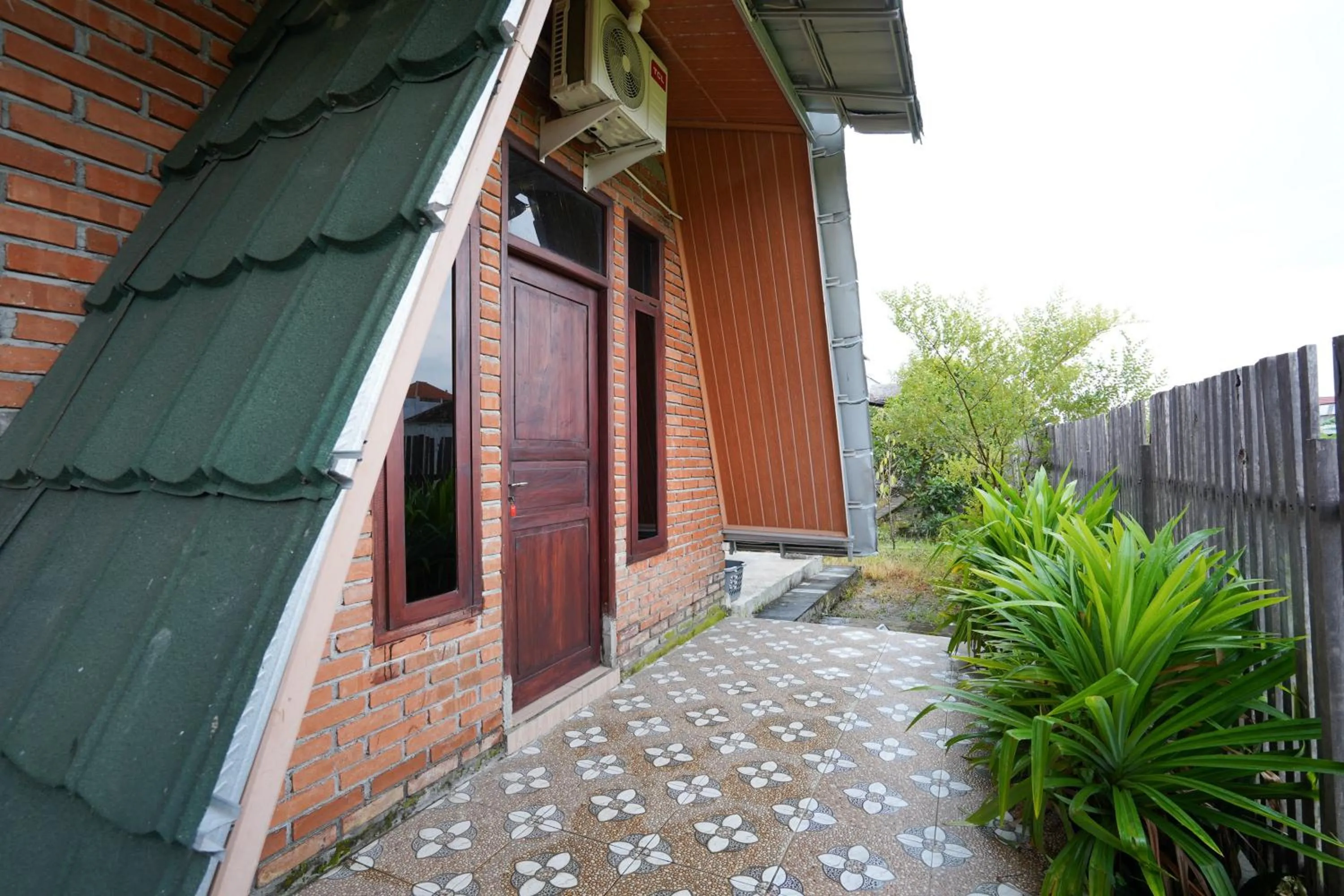 Property building in RedDoorz at Omah Kayu Homestay Yogyakarta