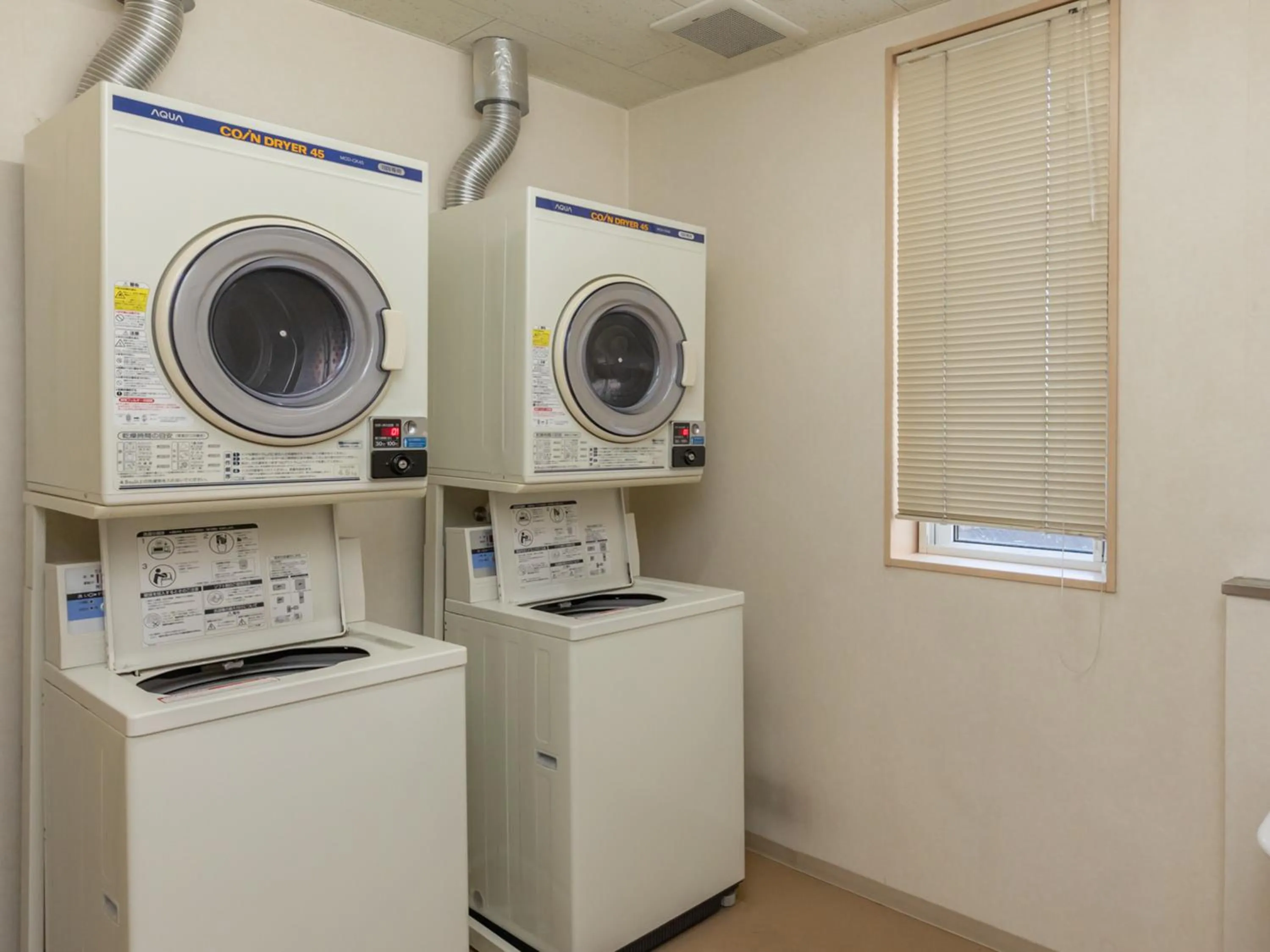 washing machine in Tabist Hachi no Oyado Numadate Heights