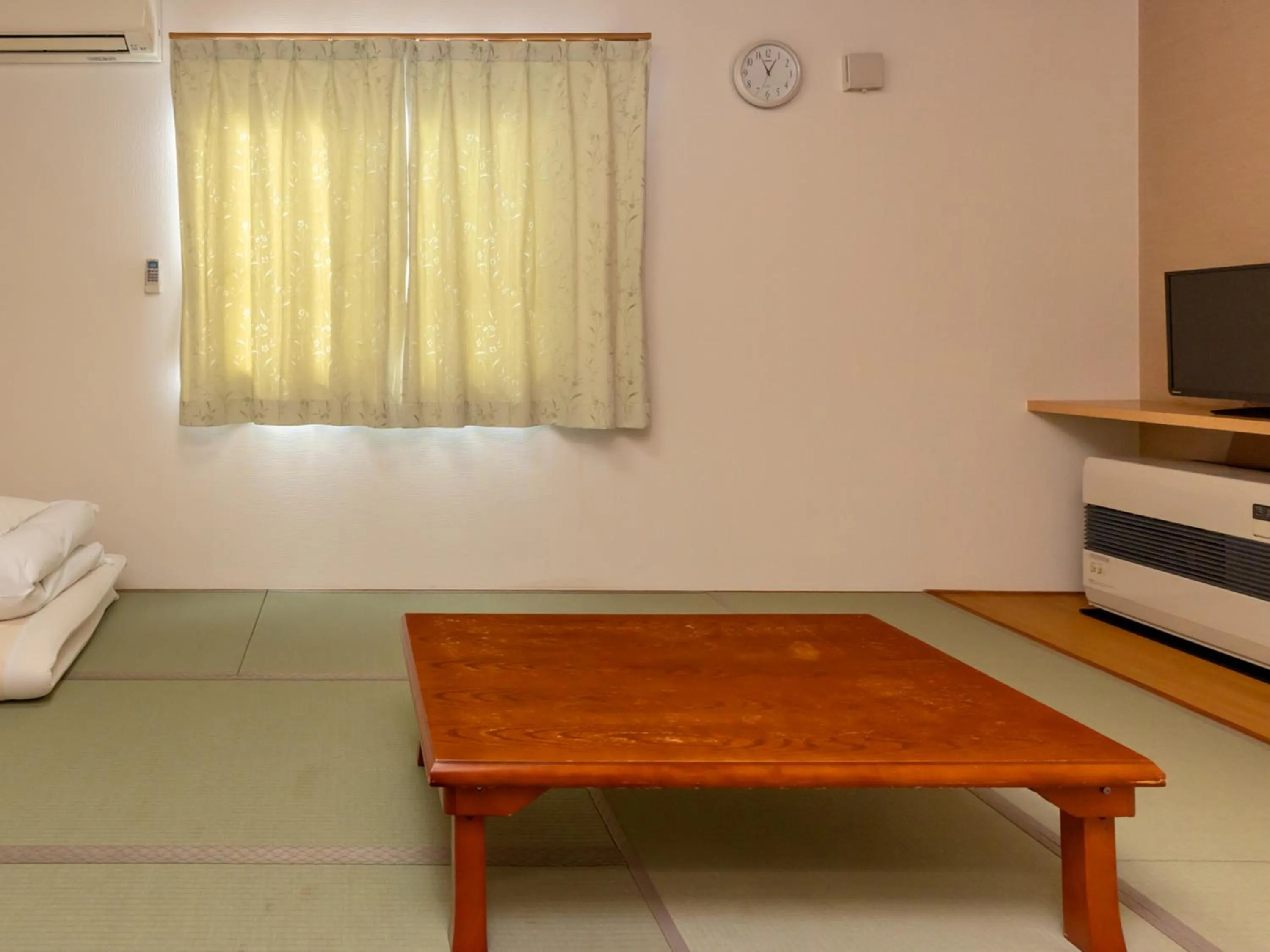 Bed in Tabist Hachi no Oyado Numadate Heights