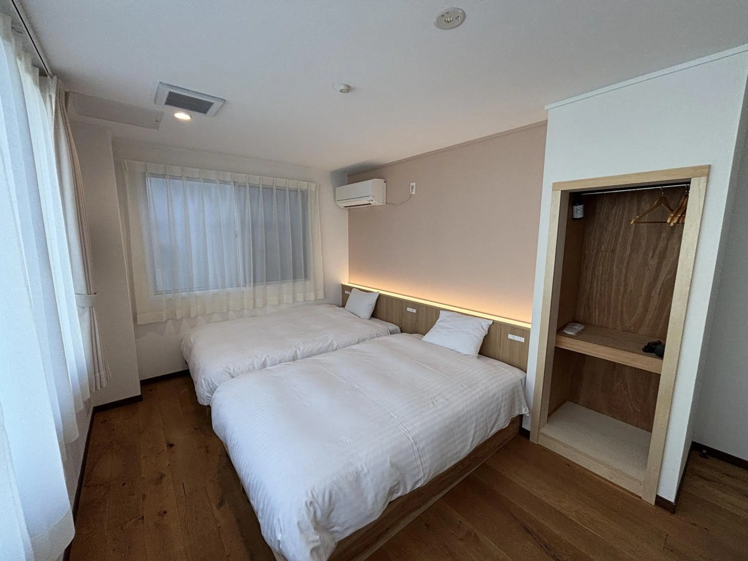 Bedroom, Bed in nirasakiyaSTAY