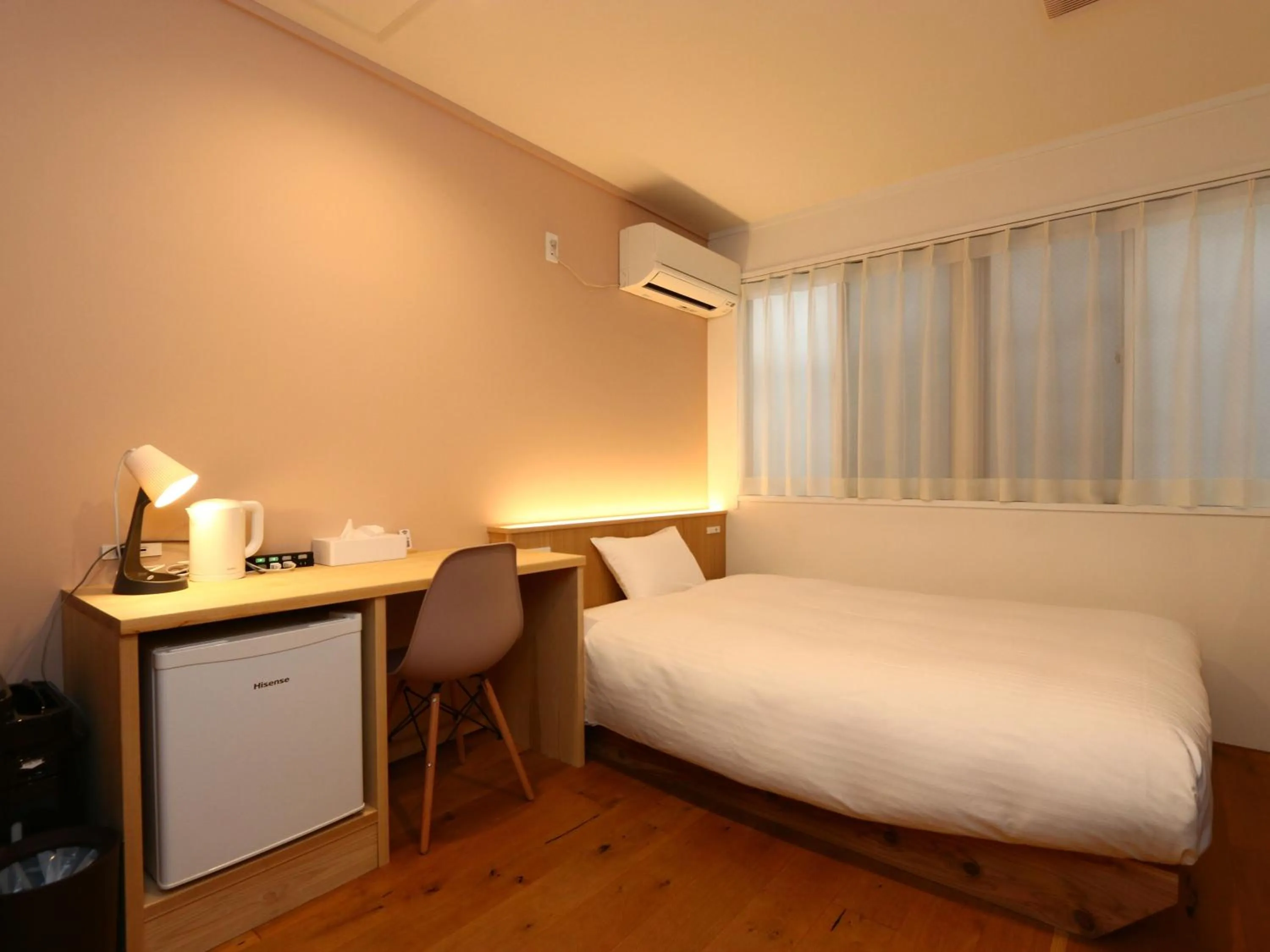 Bed in nirasakiyaSTAY