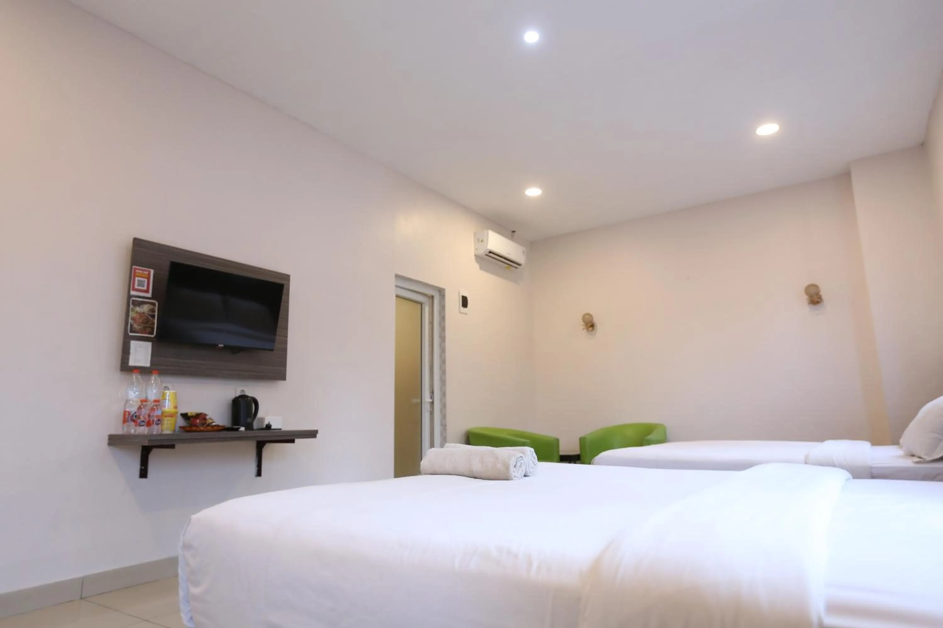 Bed in De'Tonga Hotel