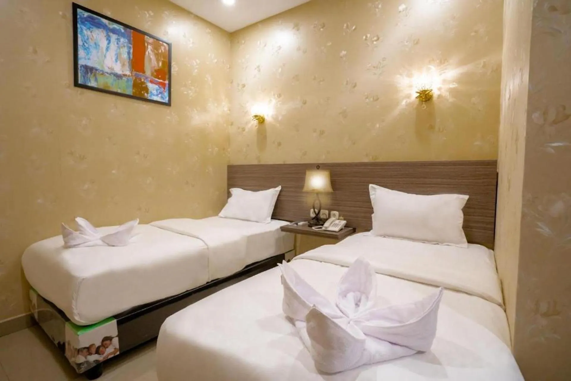 Bed in De'Tonga Hotel