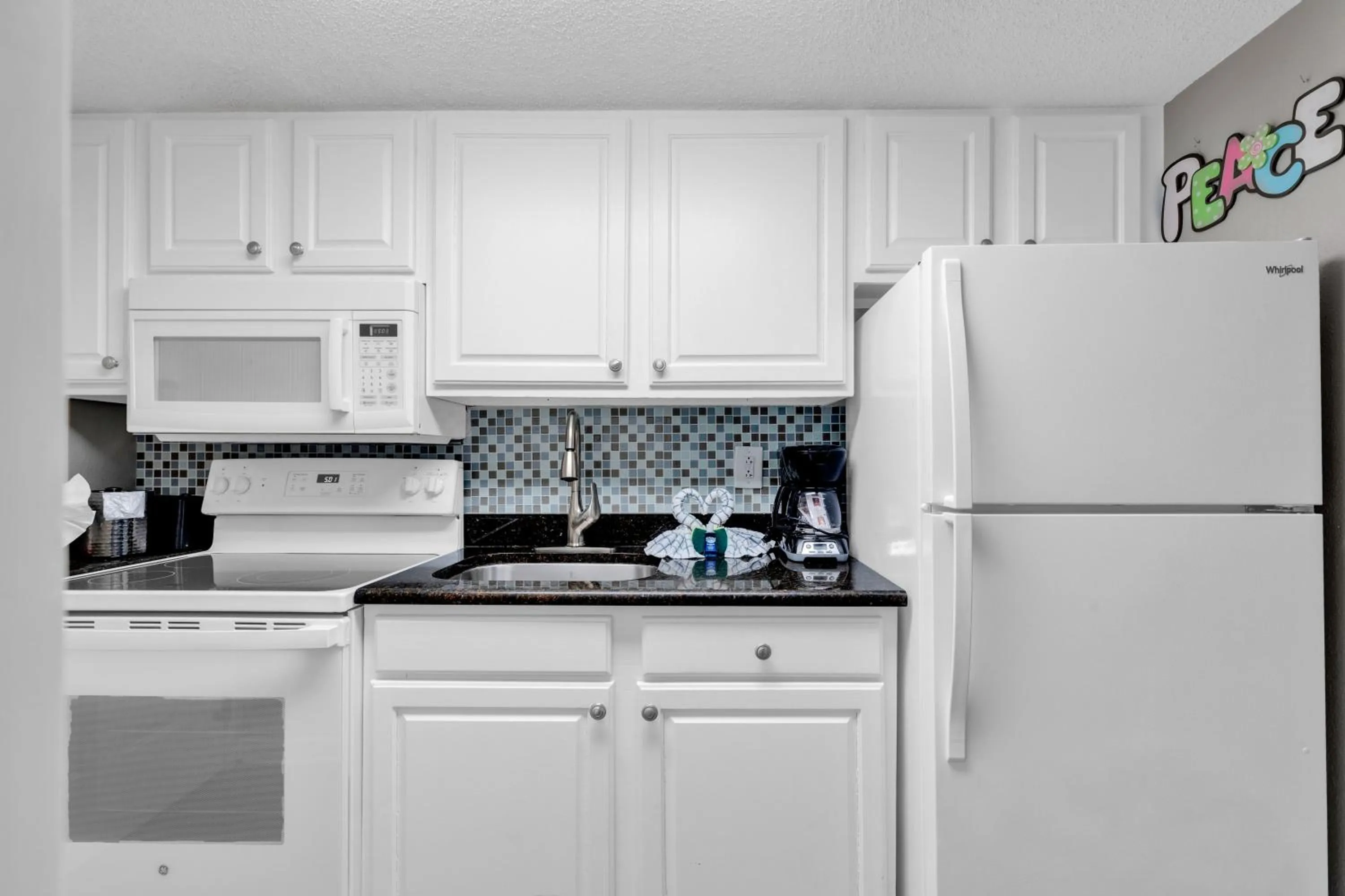 Kitchen or kitchenette in Ocean-Front Condos at Patricia Grand