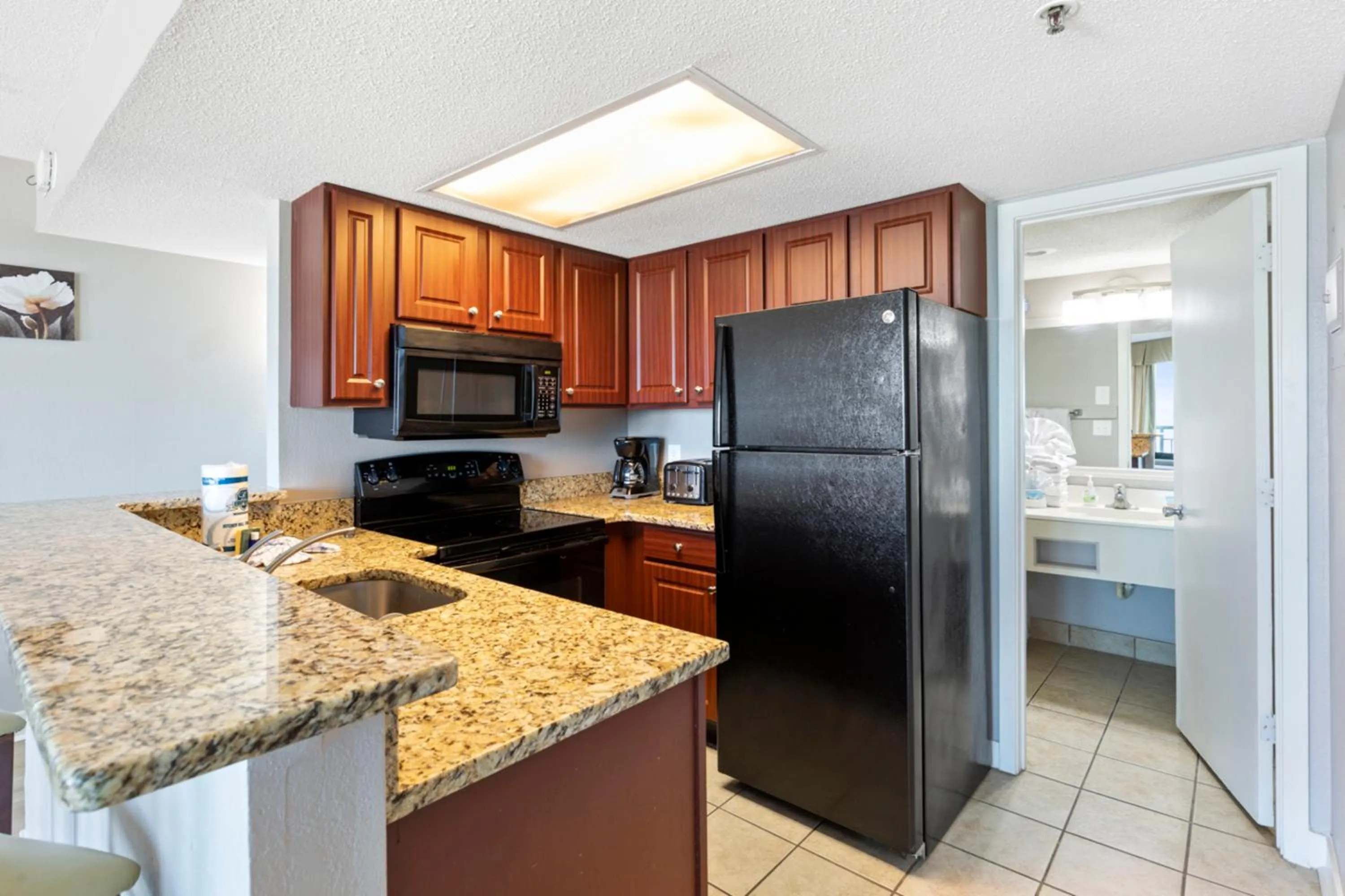 Kitchen or kitchenette in Ocean-Front Condos at Patricia Grand
