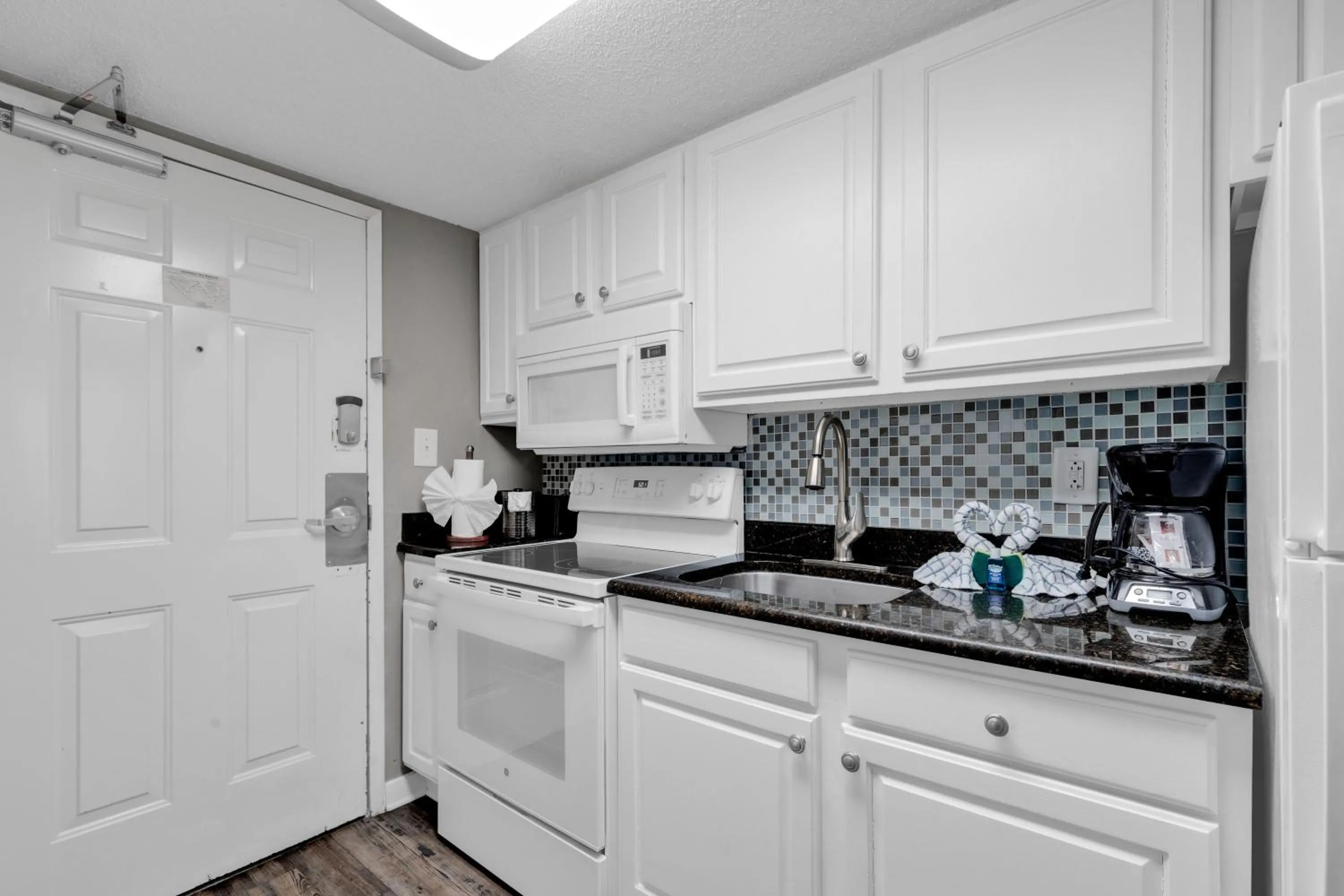 Kitchen or kitchenette in Ocean-Front Condos at Patricia Grand