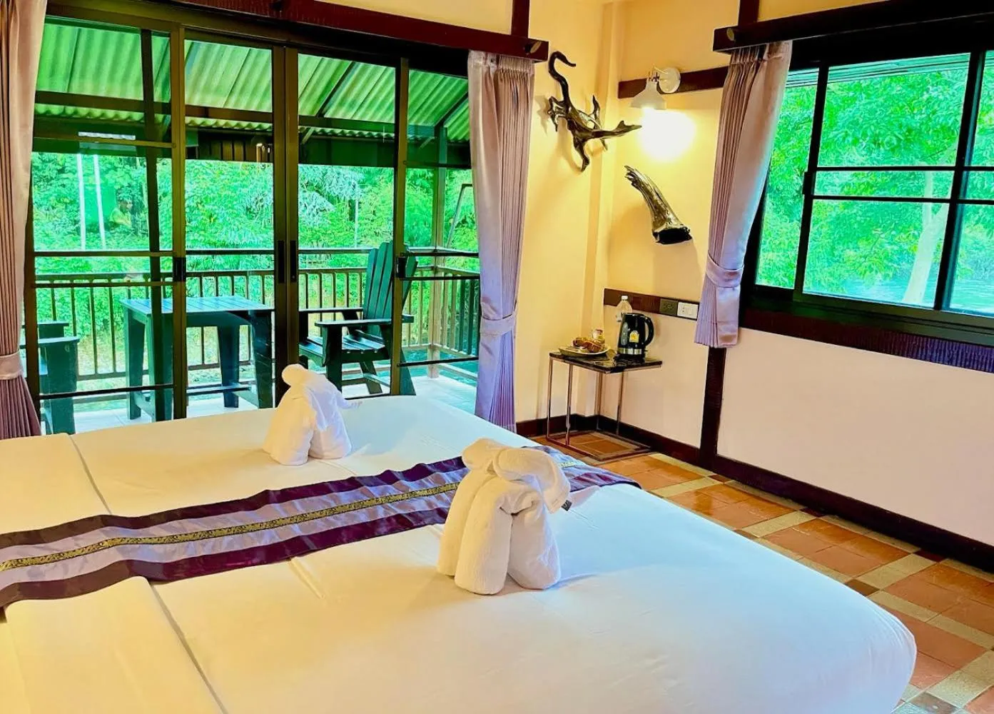 Bed in Khao Sok River Lodge Hotel