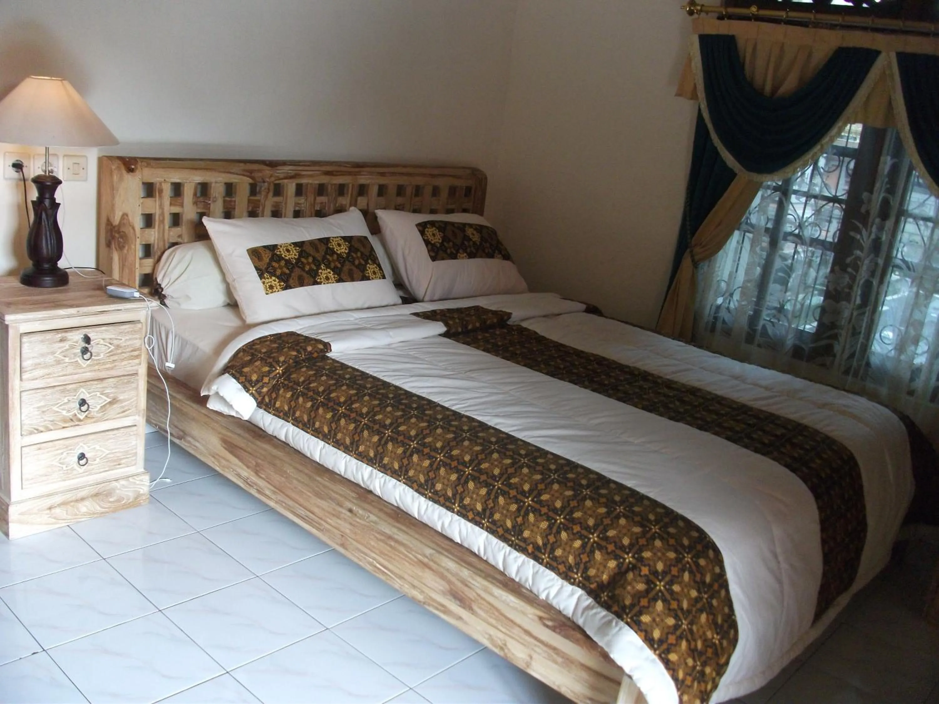 Bed in Arsa Homestay & Spa
