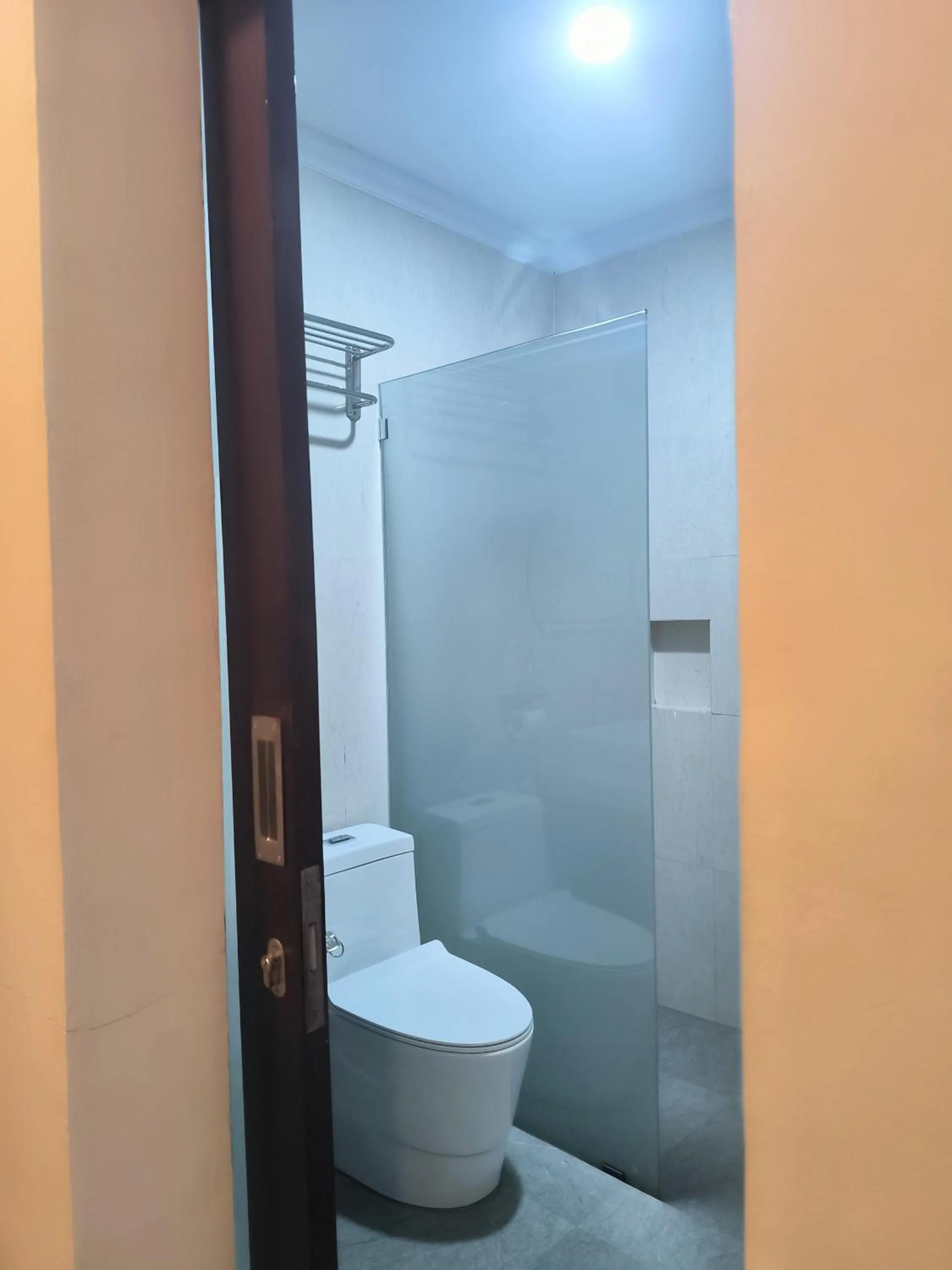 Toilet in Arsa Homestay & Spa