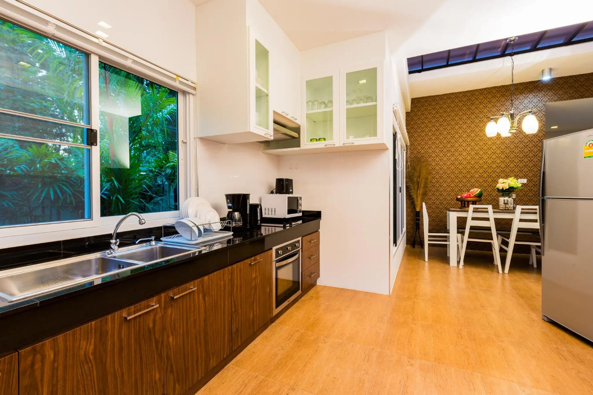 Kitchen or kitchenette in Irawan House
