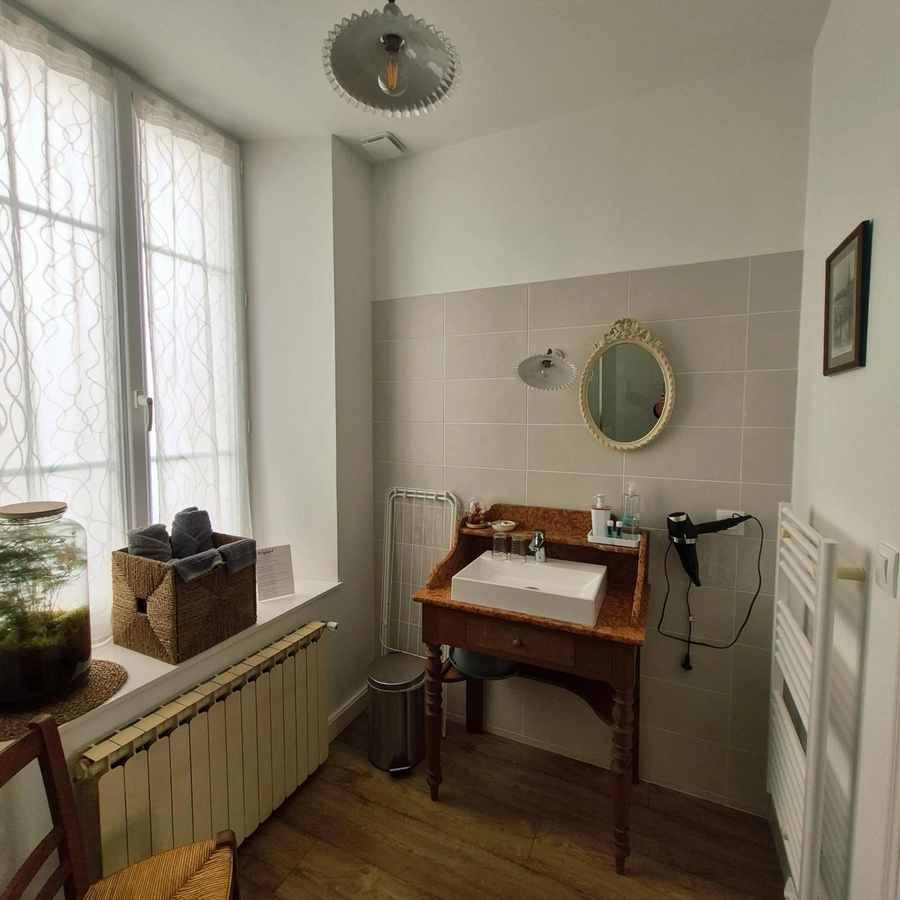 Bathroom in Maison d’hôtes KERGIQUEL