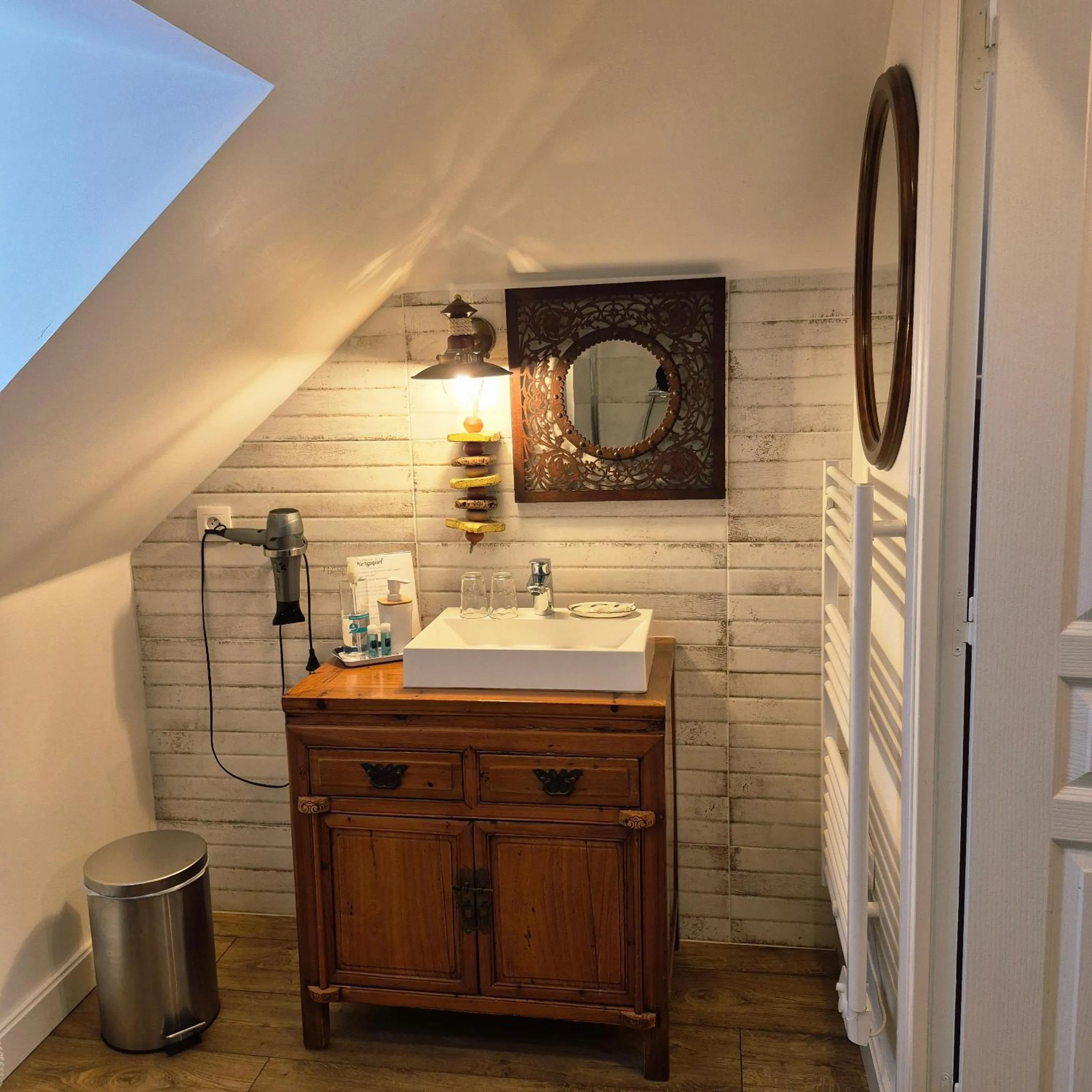 Bathroom in Maison d’hôtes KERGIQUEL