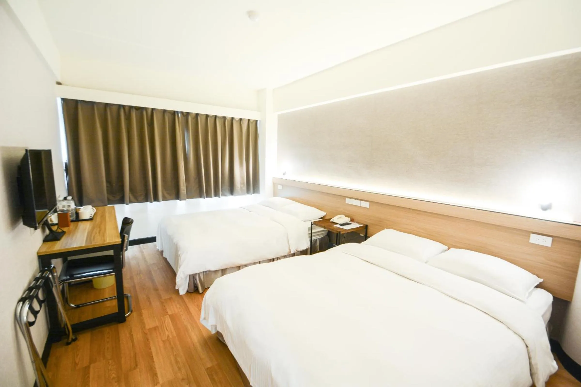 Bed in New World Hotel