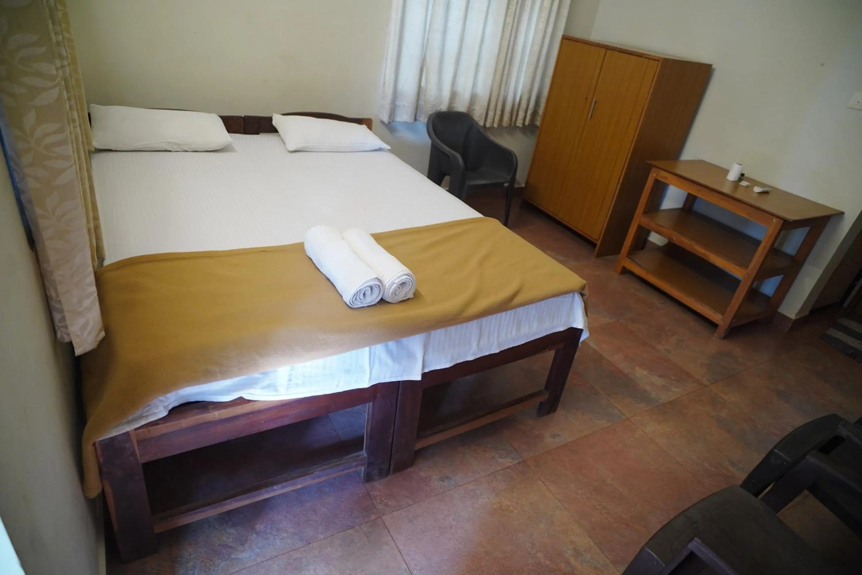 Photo of the whole room, Bed in God's Gift Guest House