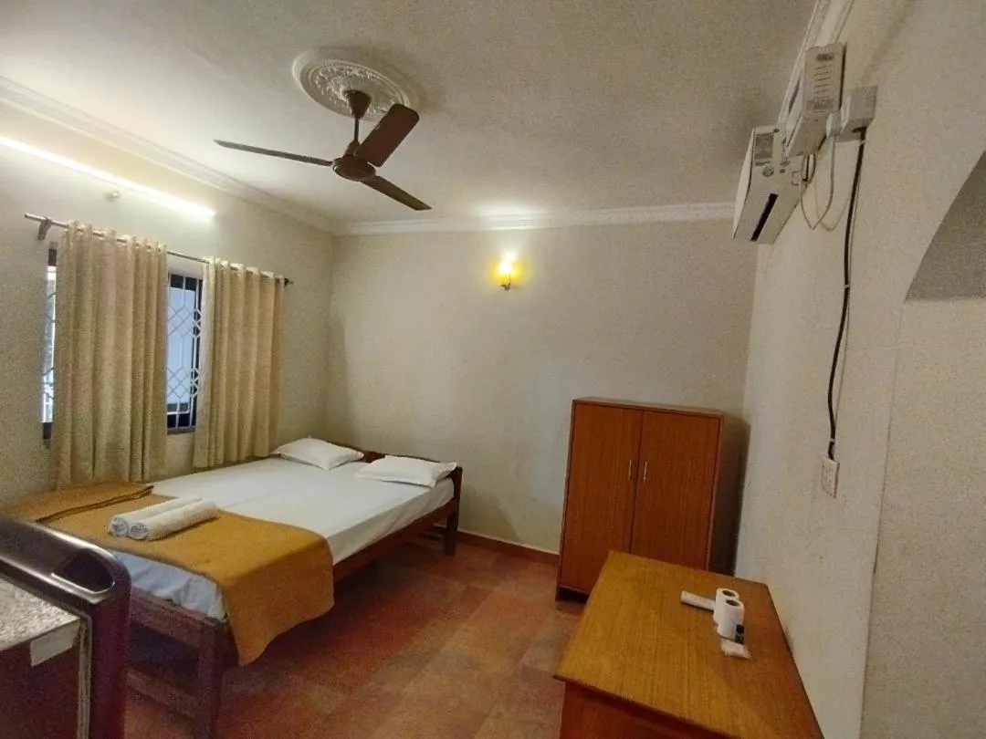 Photo of the whole room, Bed in God's Gift Guest House