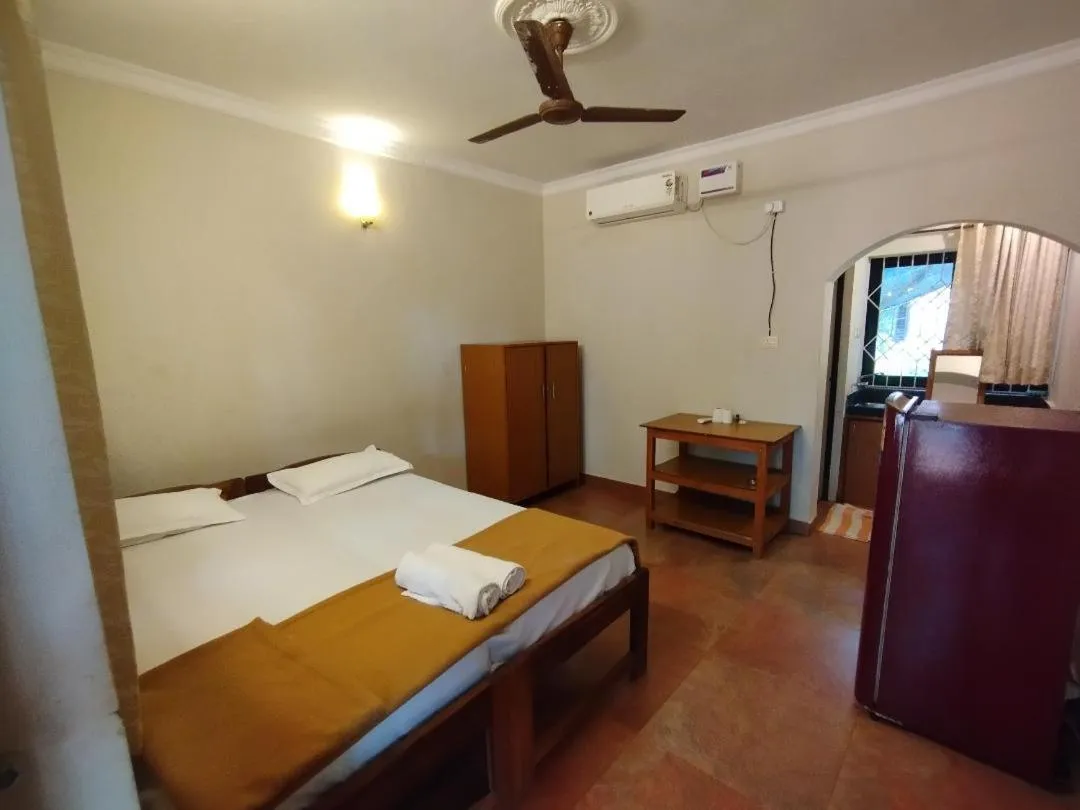 Photo of the whole room, Bed in God's Gift Guest House