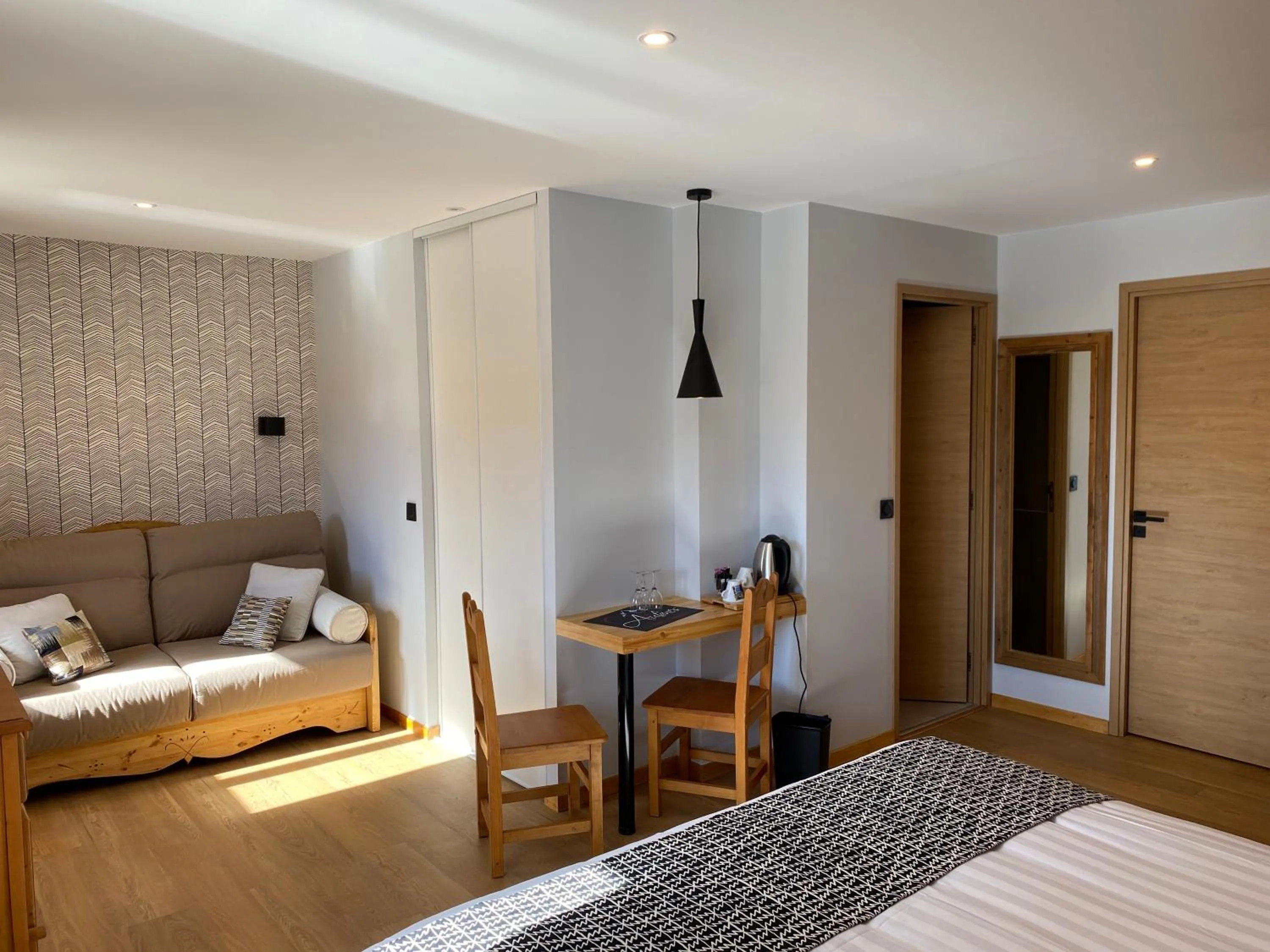 Photo of the whole room, Bed in Logis Hôtel & Spa Les Autanes