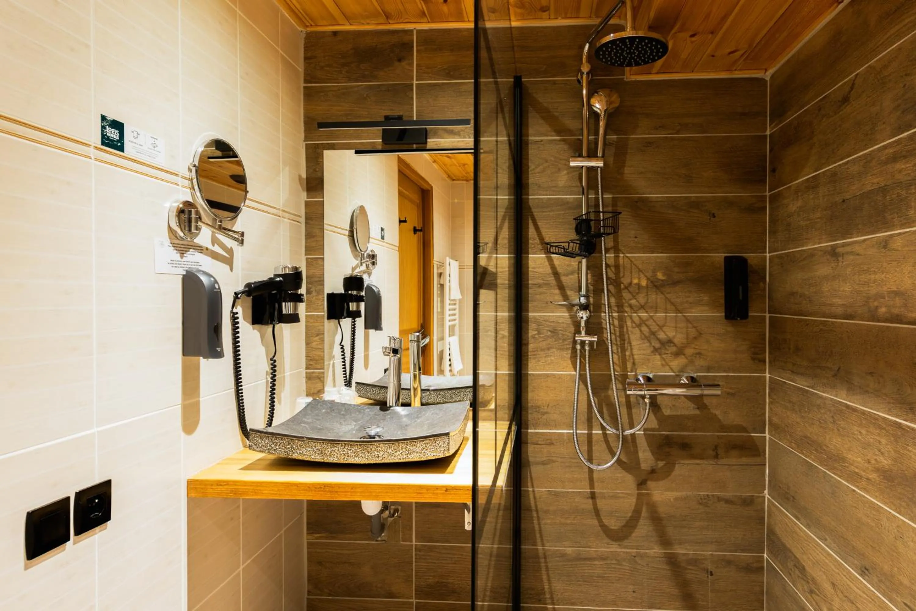 Bathroom in Logis Hôtel Les Autanes & Spa