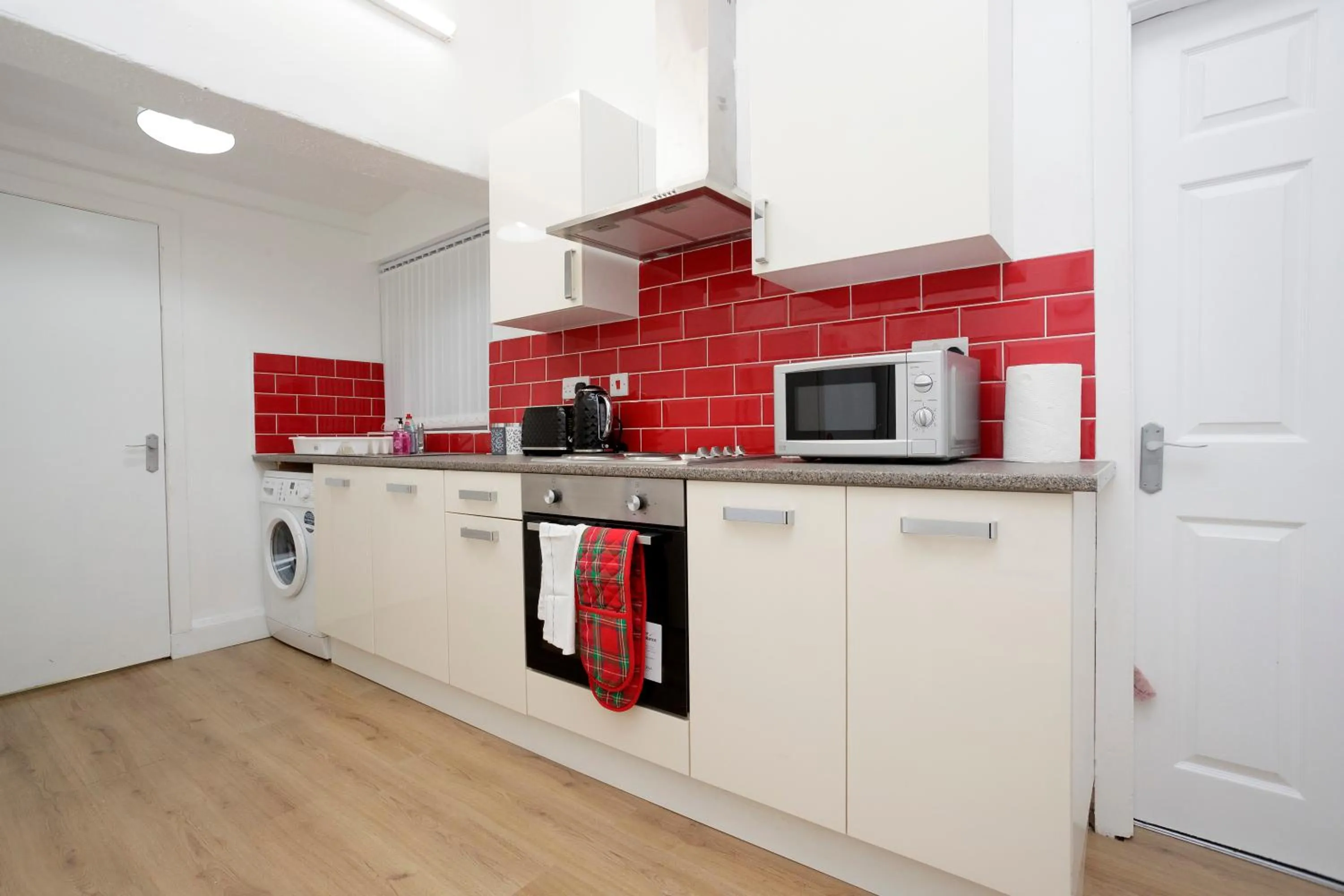 Kitchen or kitchenette in KIRKSTALL SERVICED APARTMENTS LEEDS