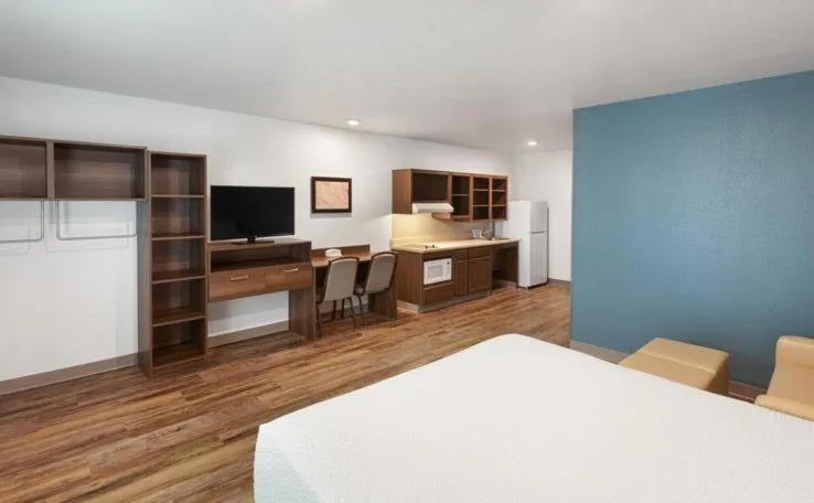 Bed in WoodSpring Suites Lackland near Sea World