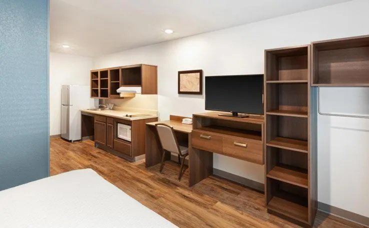 Bed in WoodSpring Suites Lackland near Sea World