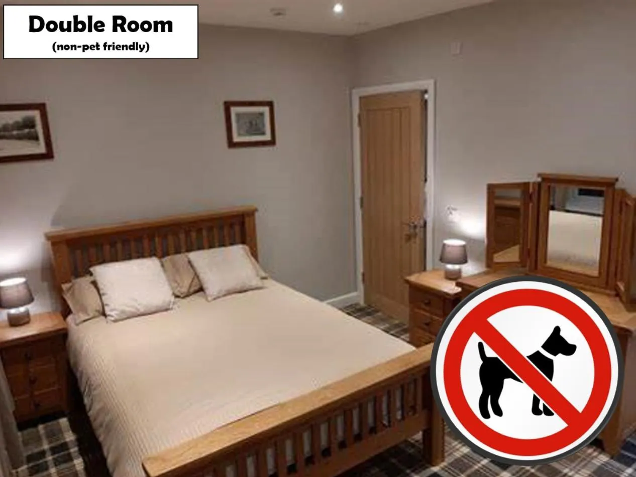 Bed in Fountain Cottage Cafe and B&B