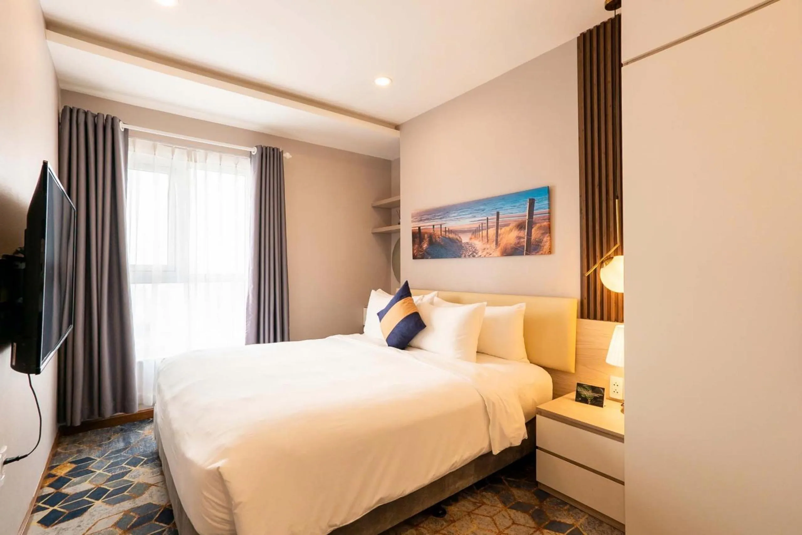 Bedroom, Bed in La Vela Saigon Hotel