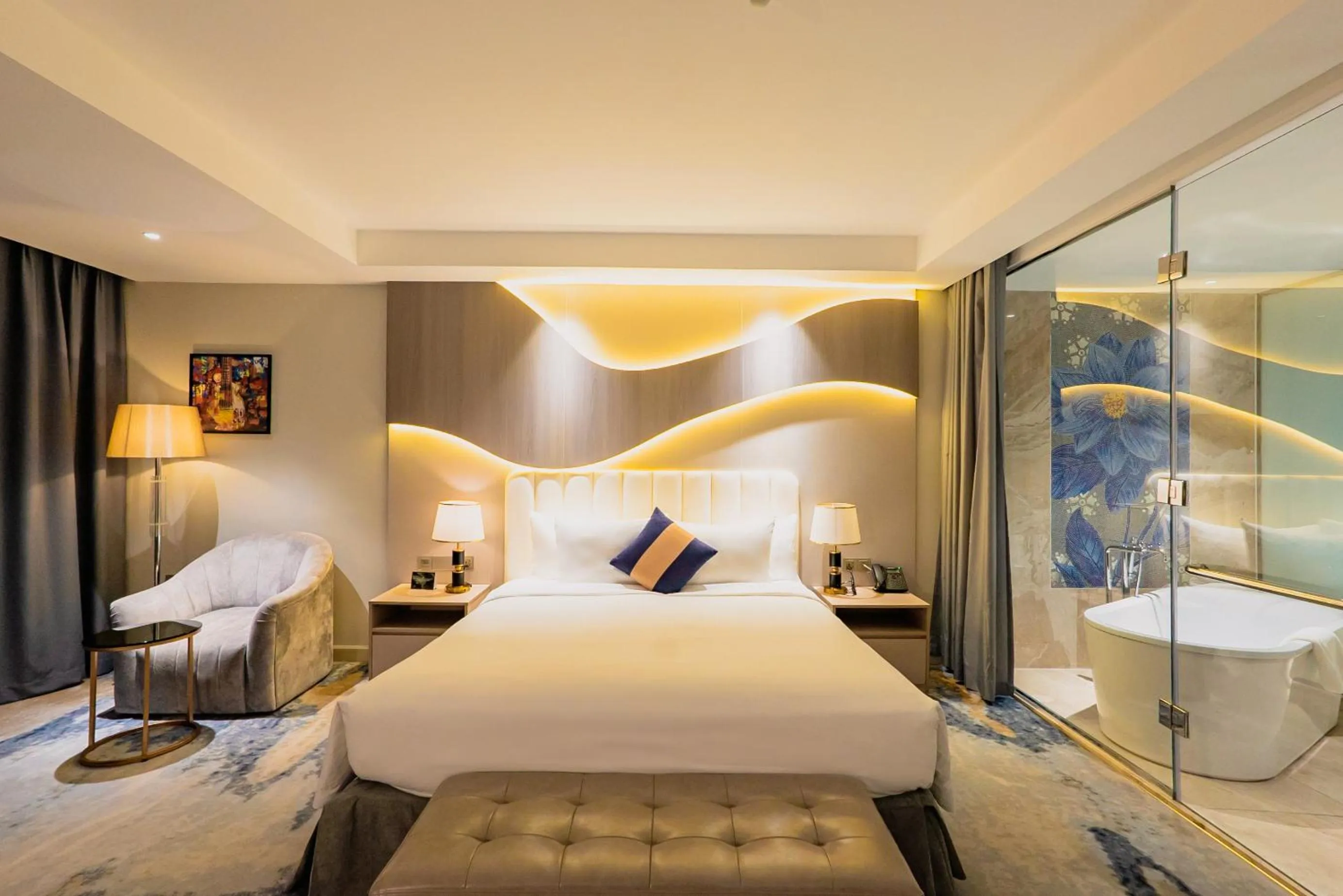 Bed in La Vela Saigon Hotel