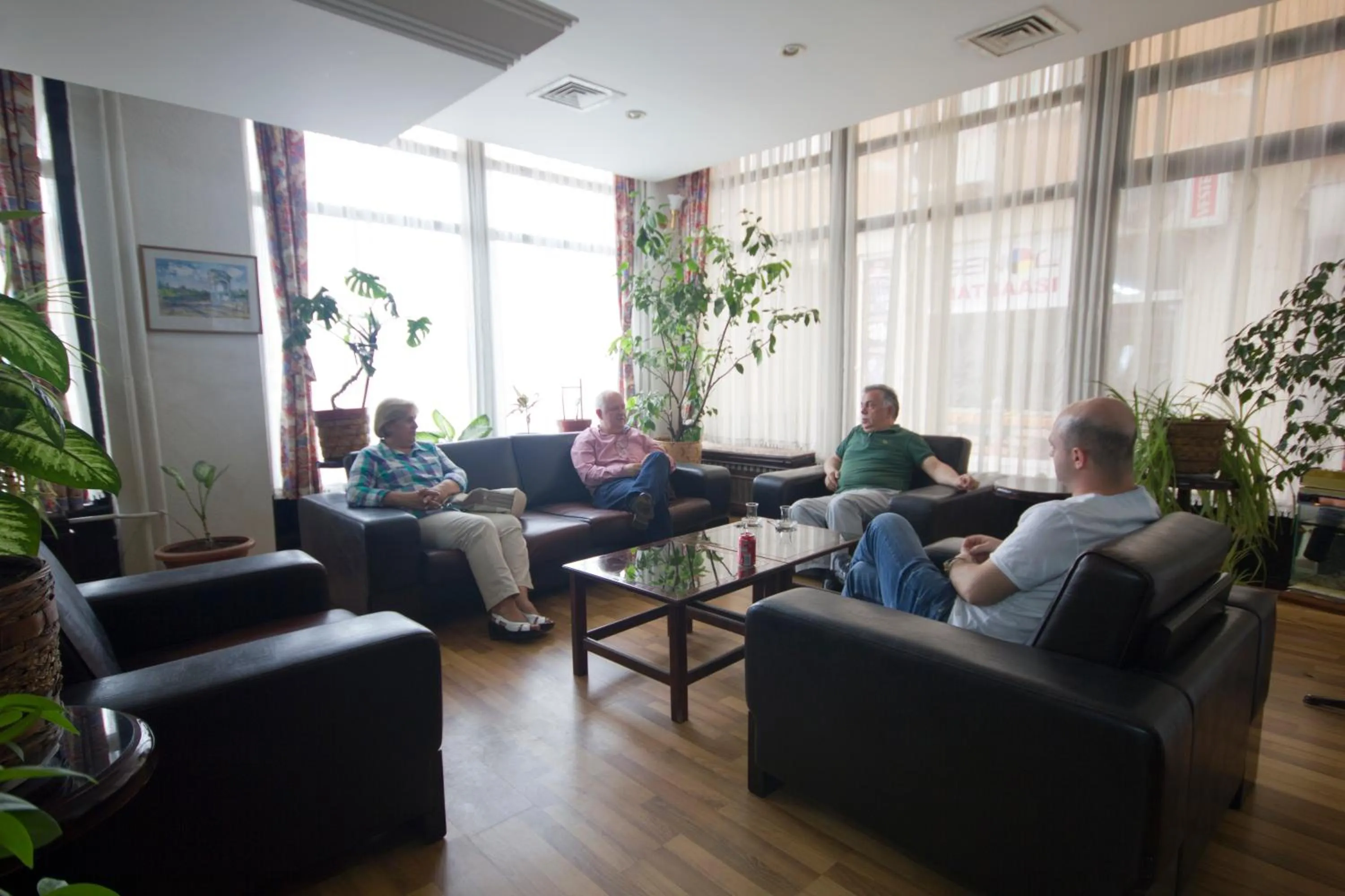 Communal lounge/ TV room in Saban Acikgoz Hotel