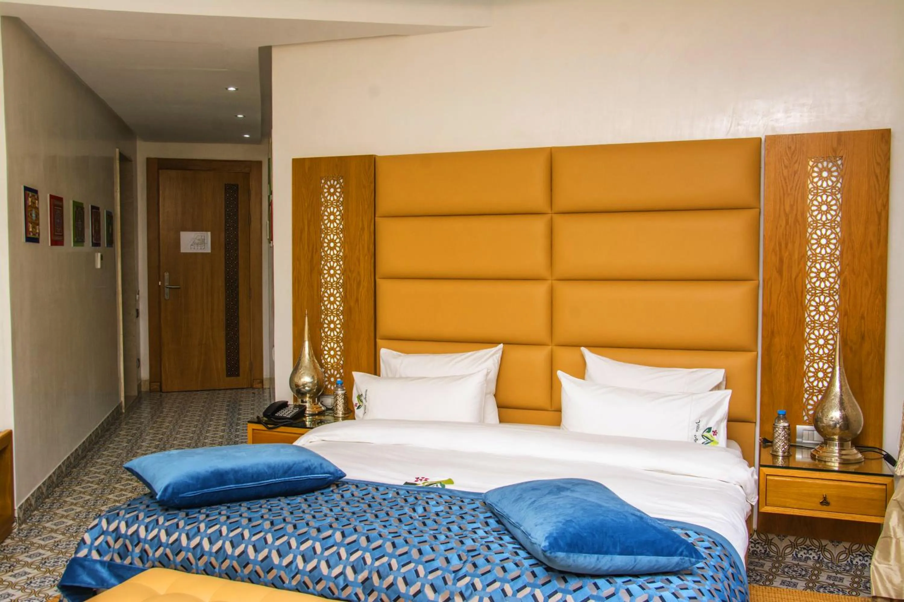 Bed in Aralia Boutique Hôtel