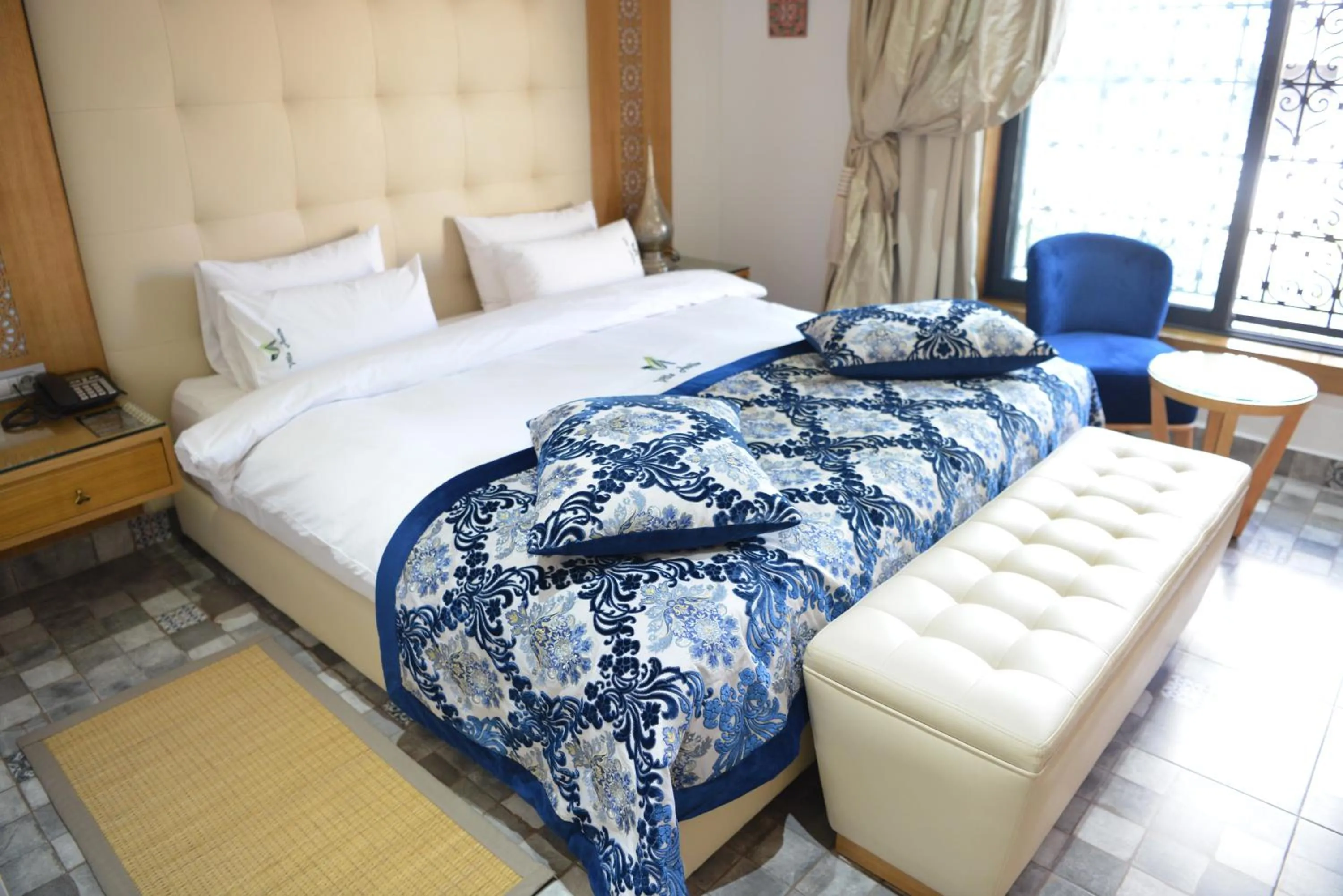 Bed in Aralia Boutique Hôtel