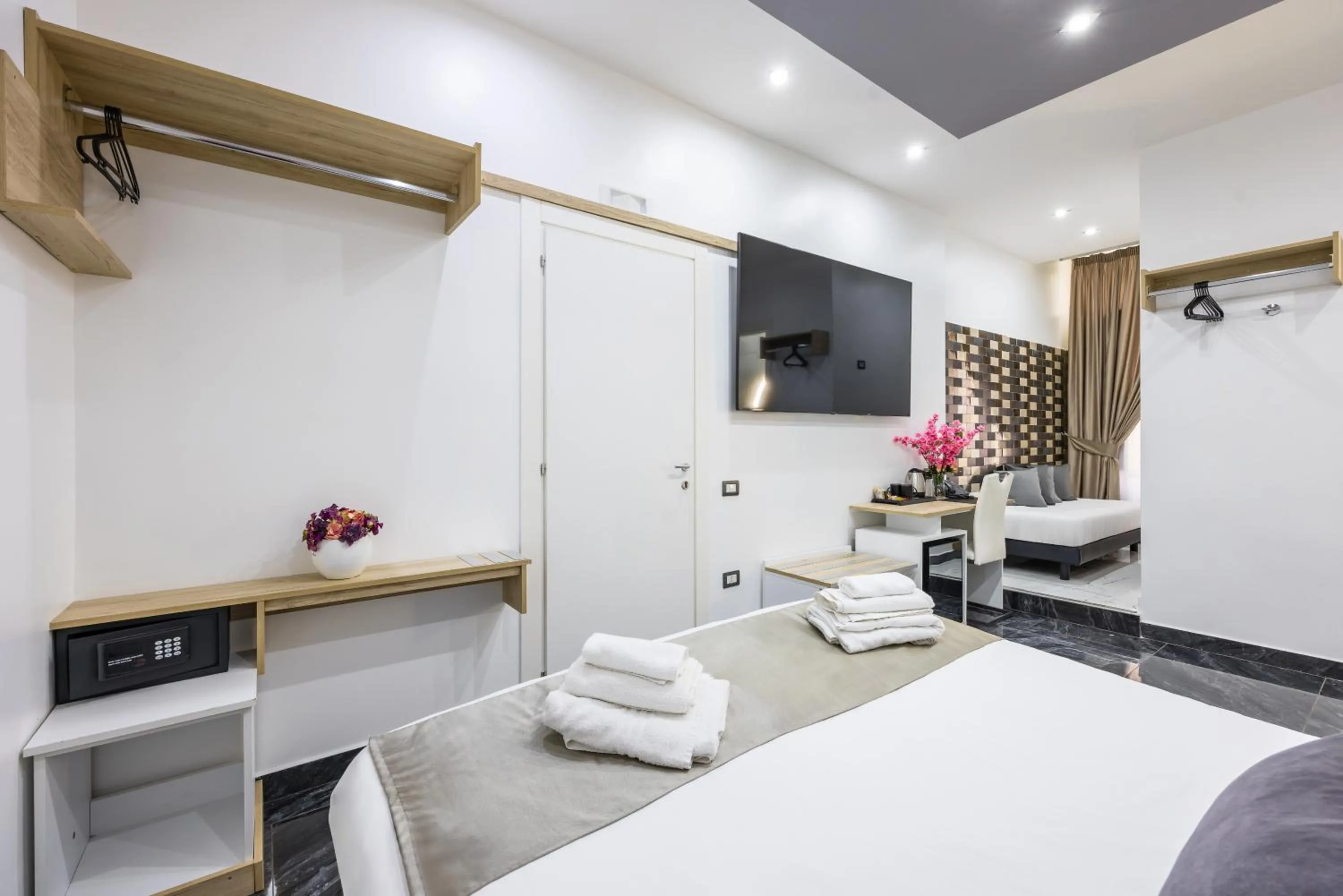 Bed in Bella Napoli Suites