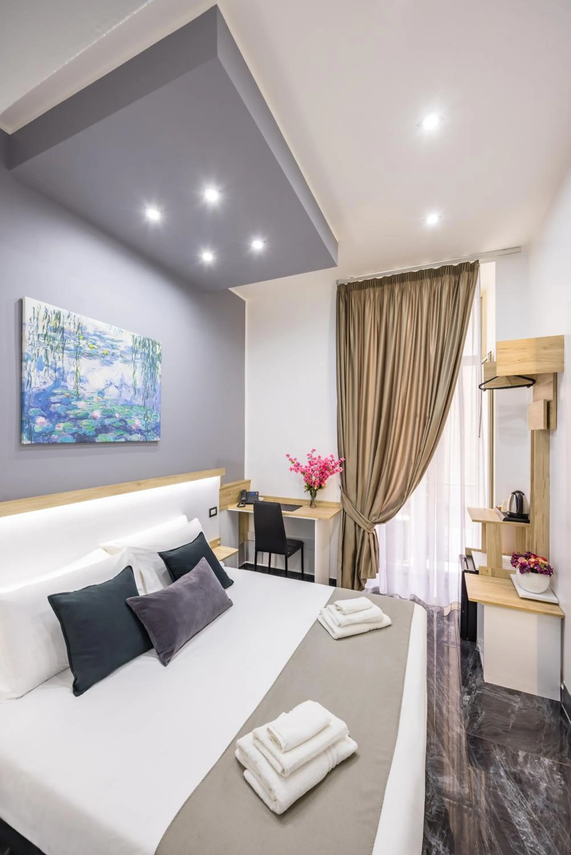 Bed in Bella Napoli Suites