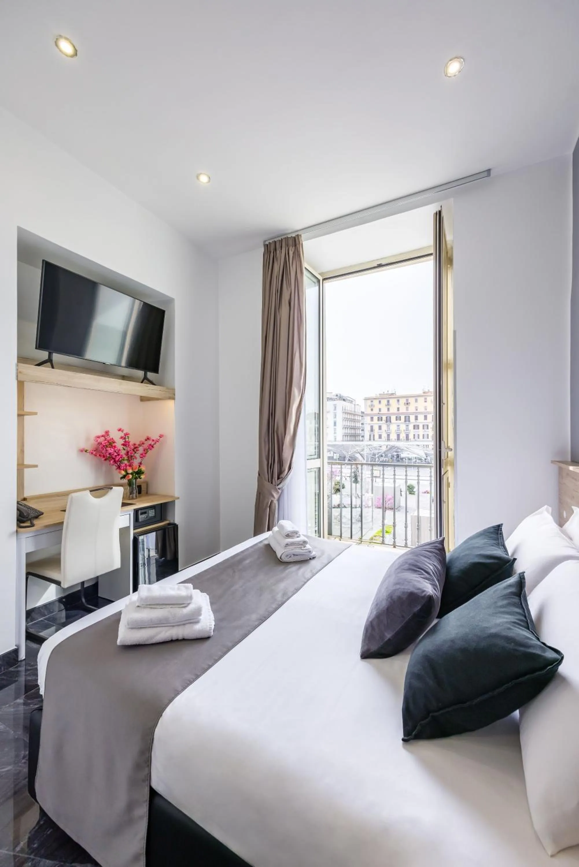 Bed in Bella Napoli Suites