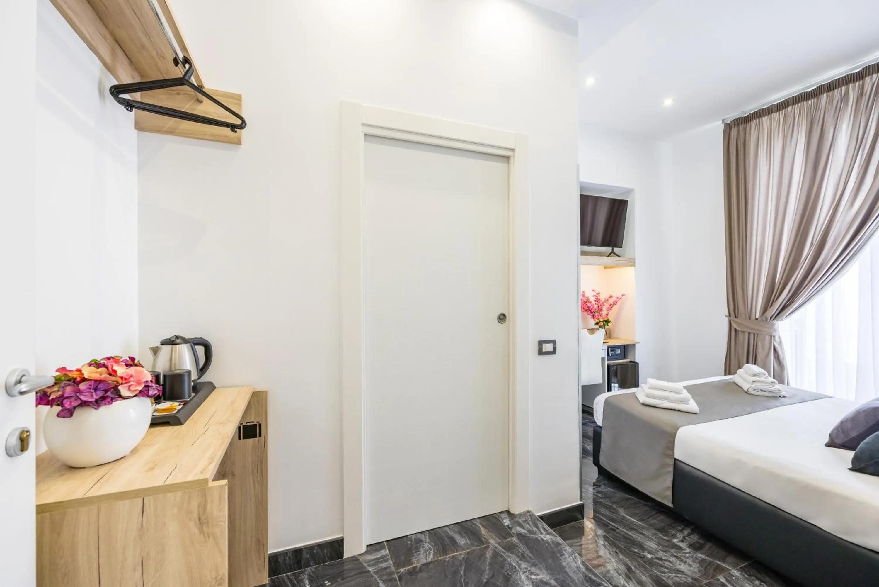 Bed in Bella Napoli Suites