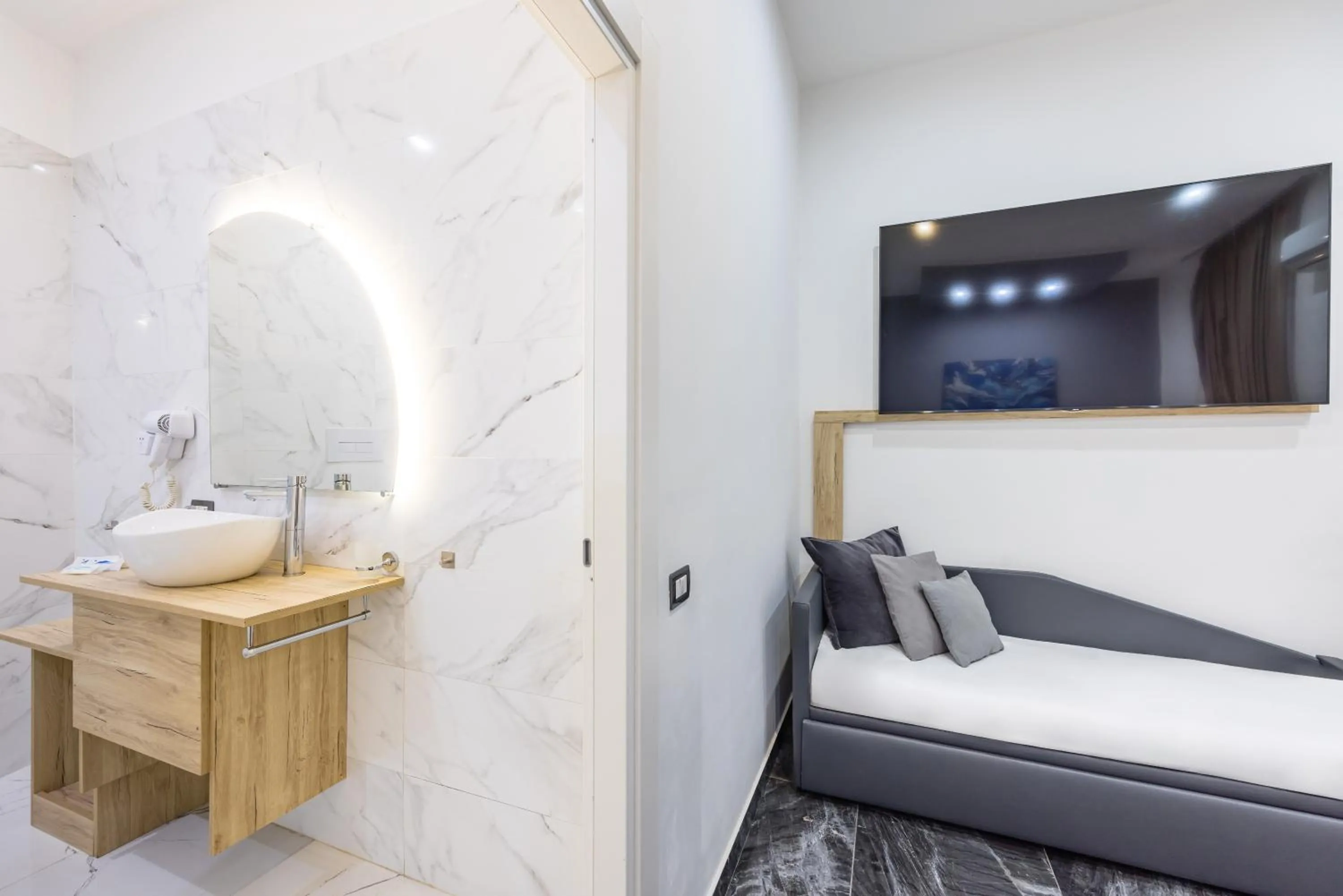 Bed in Bella Napoli Suites