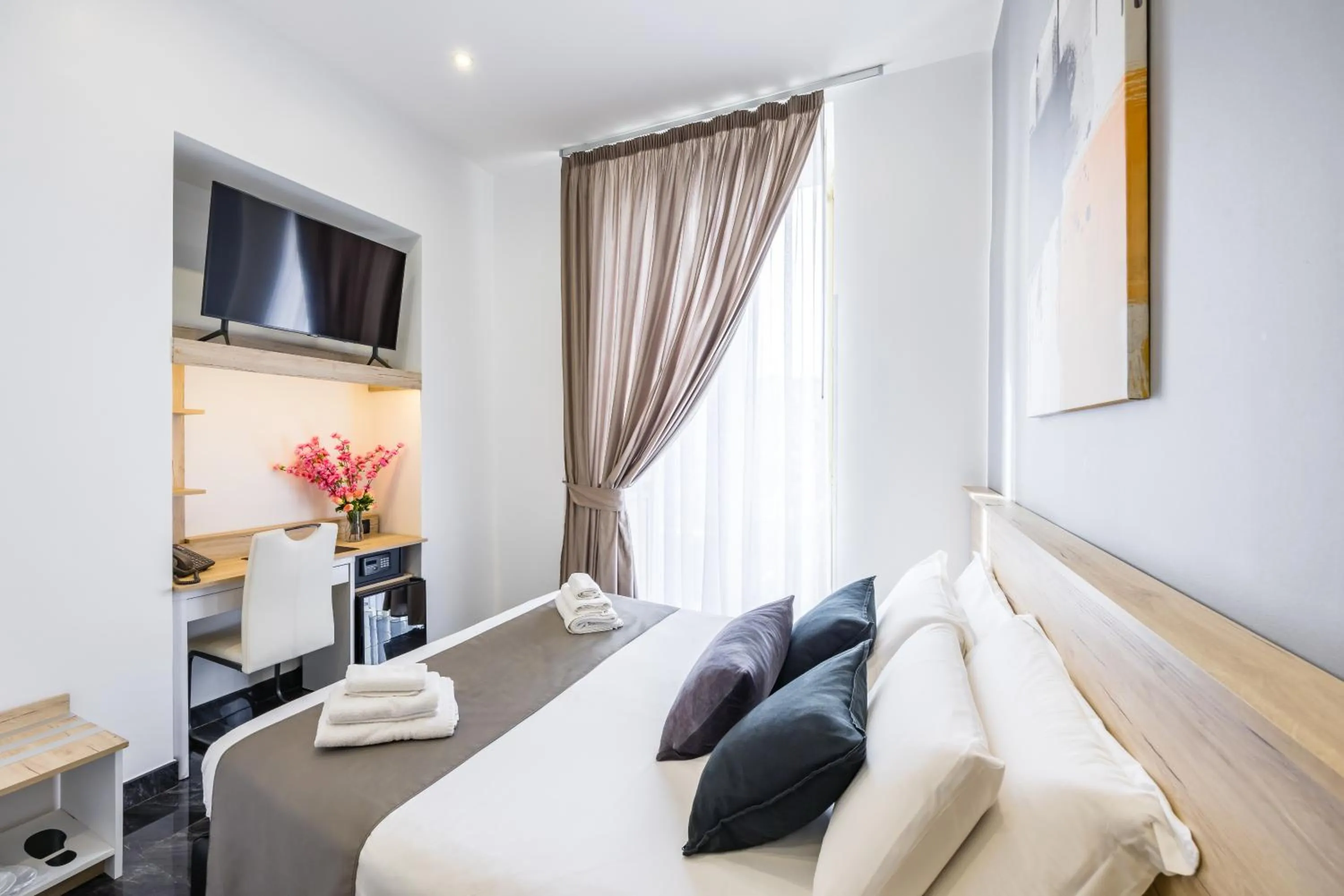 Bed in Bella Napoli Suites