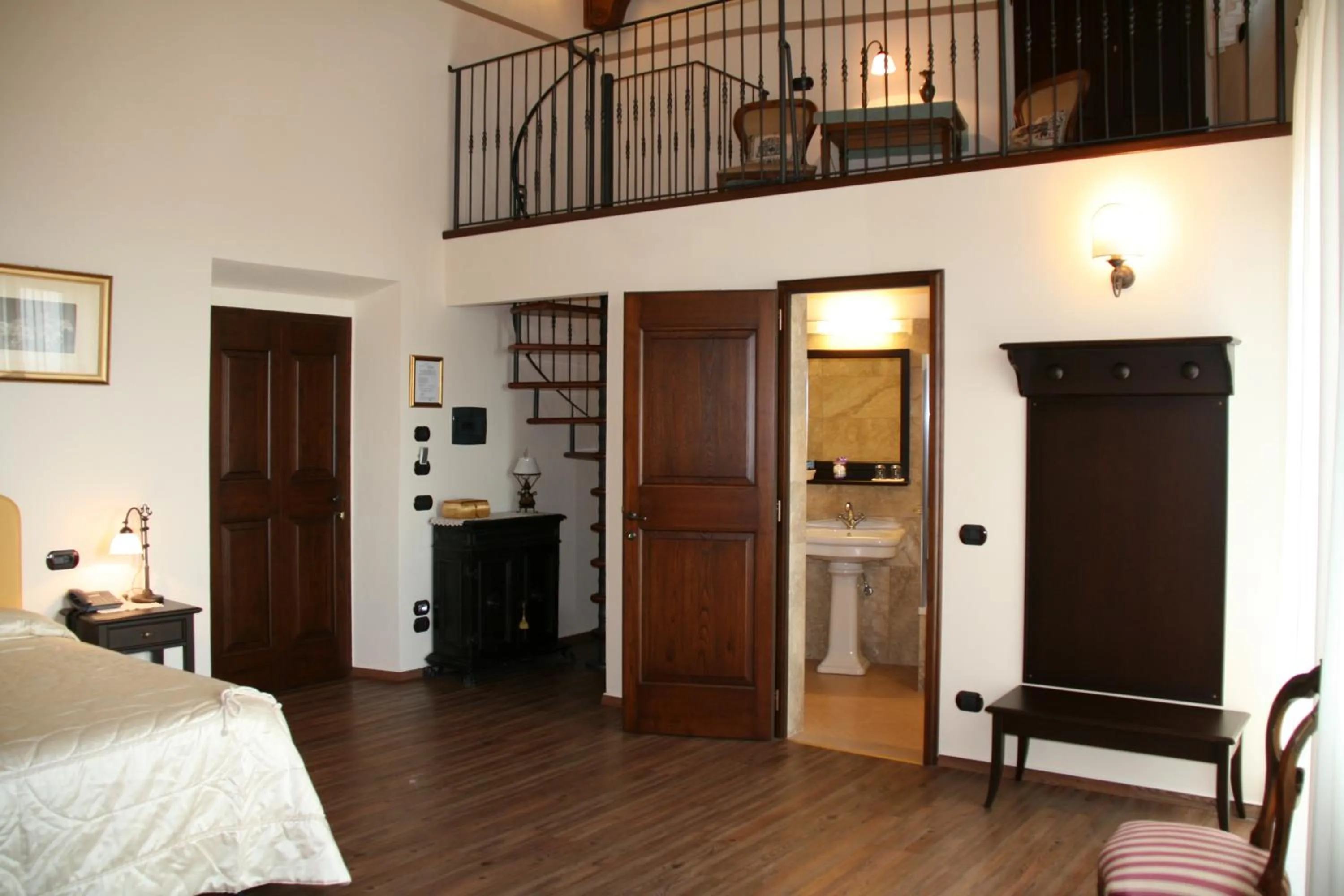 Photo of the whole room, Bed in Meublé il Riccio