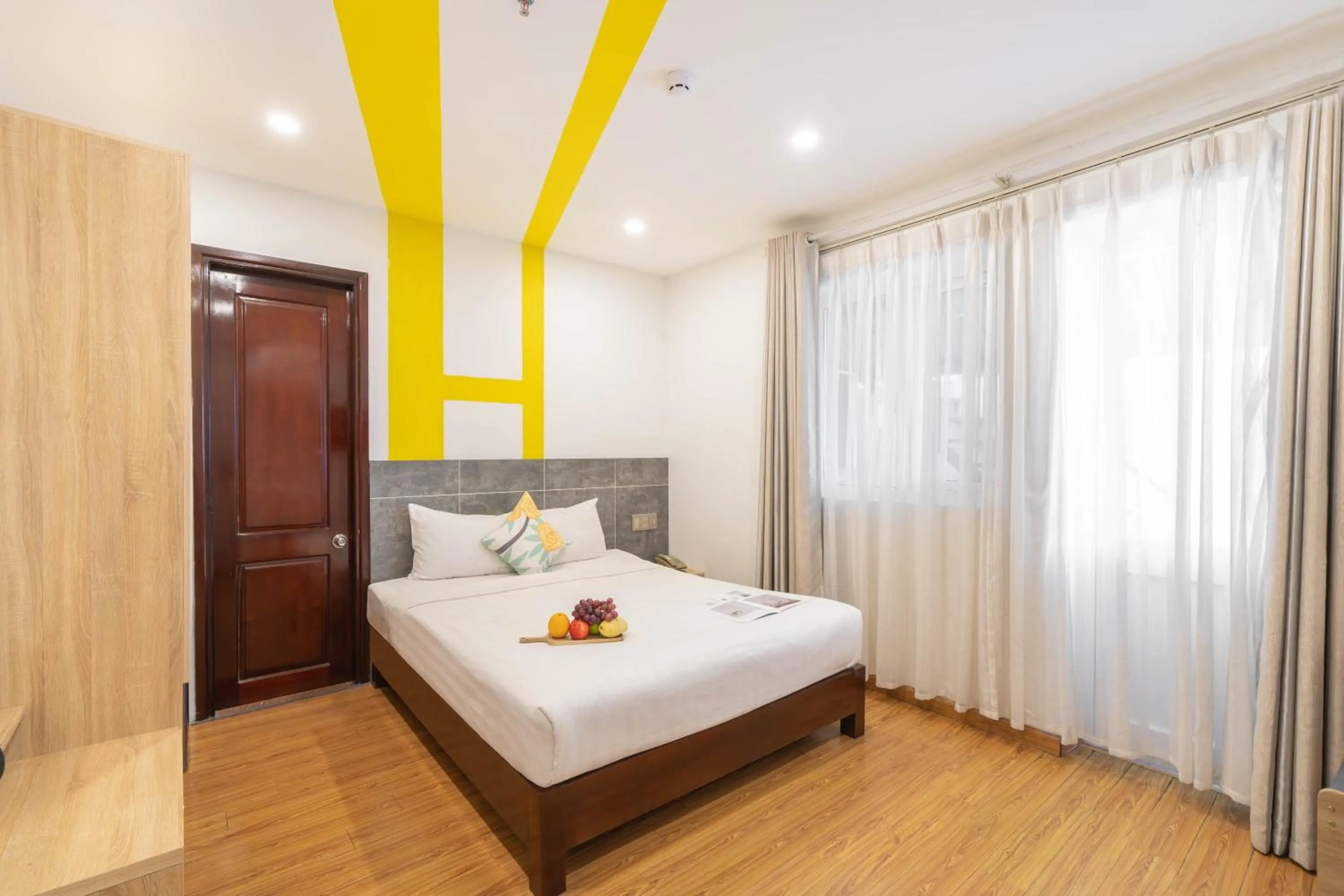 Bed in Happy Day Riverside Hotel & Spa Danang