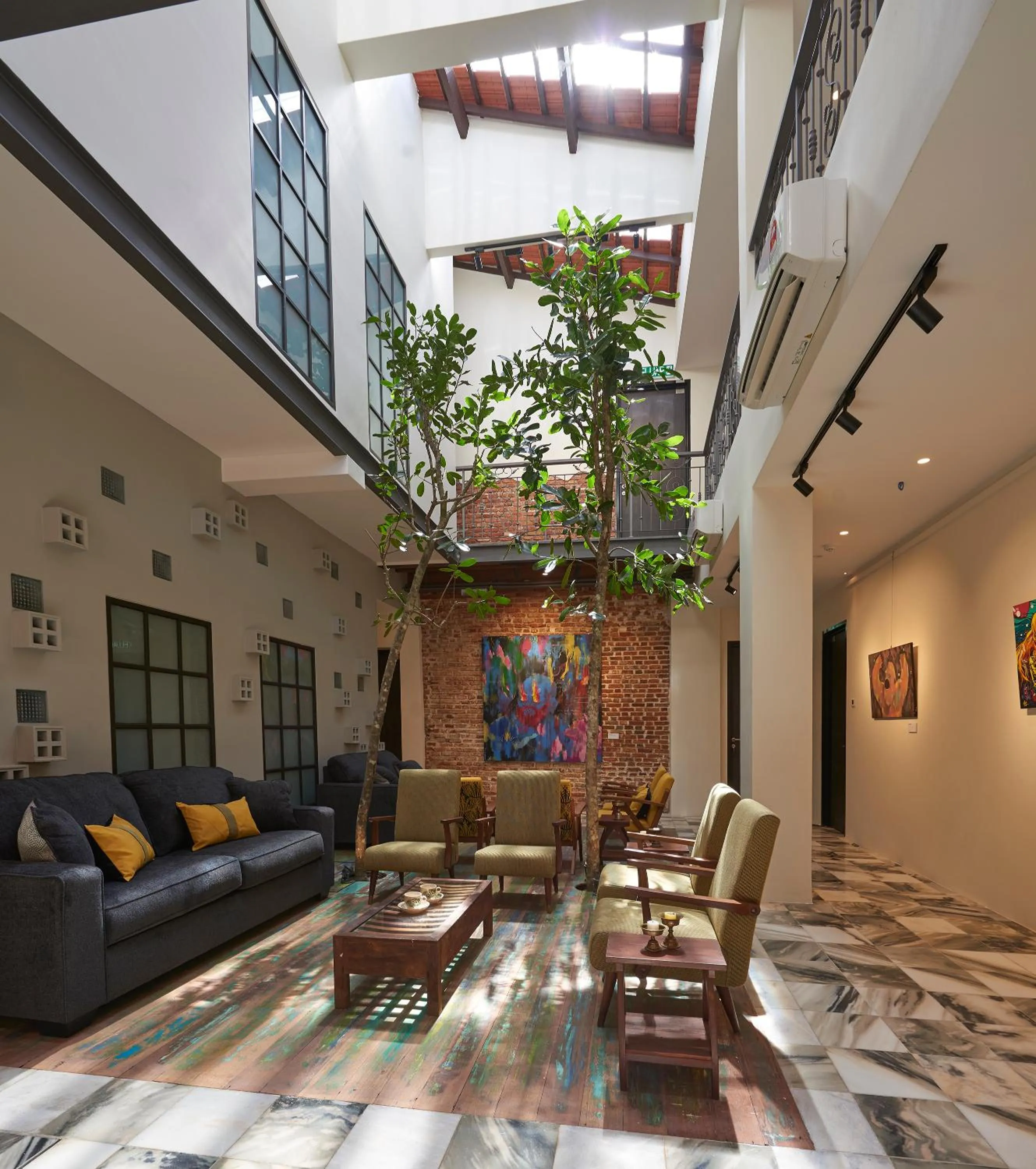 Seating area in Macalister Terraces Hotel