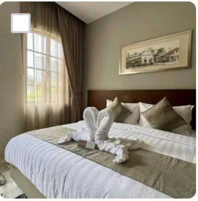 Bed in Macalister Terraces Hotel