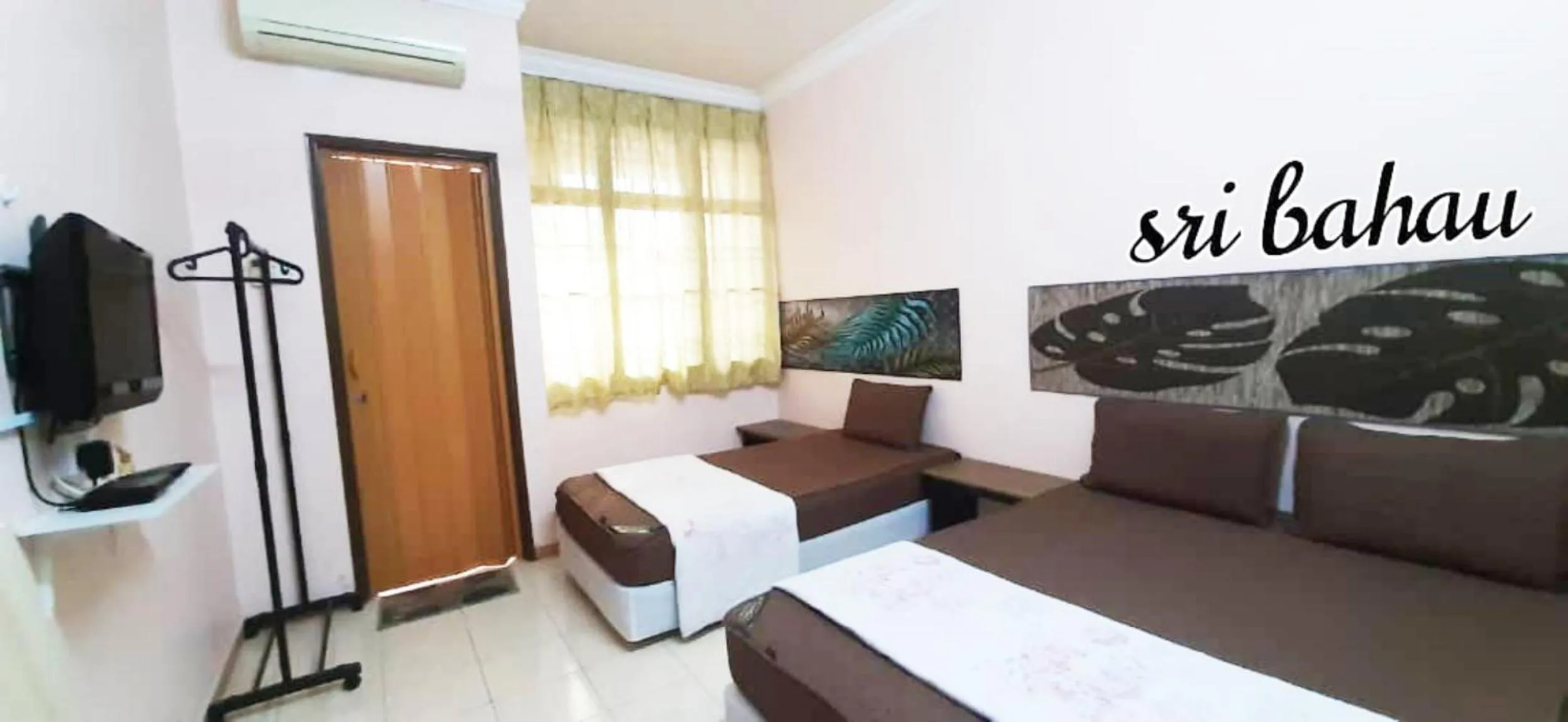 Bedroom in Hotel Sri Bahau