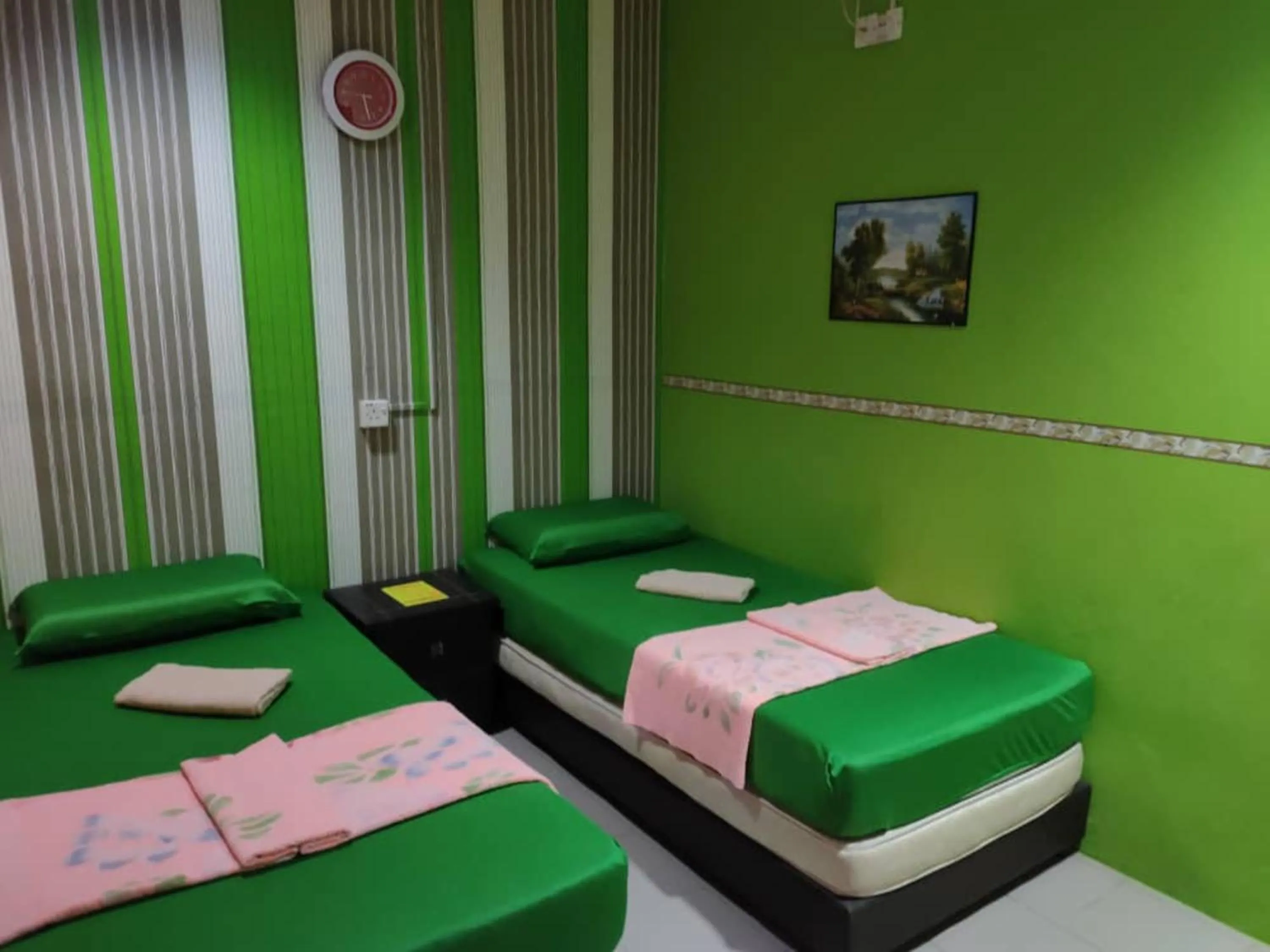 Bed in Hotel Sri Bahau