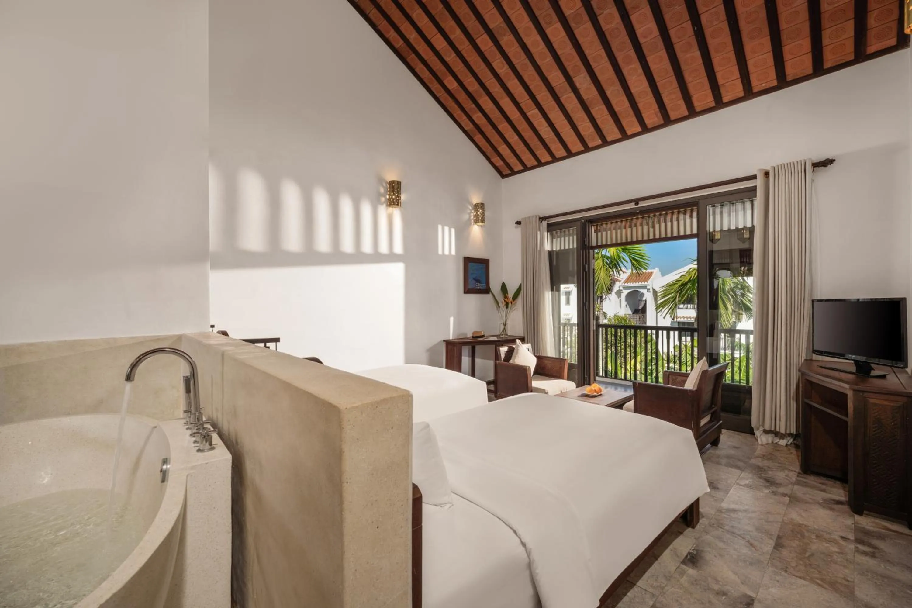 Bedroom in Legacy Hoi An Resort