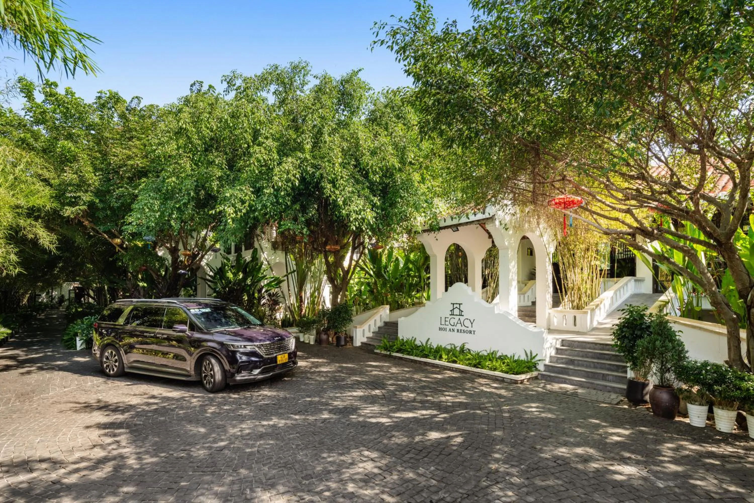 Property logo or sign in Legacy Hoi An Resort