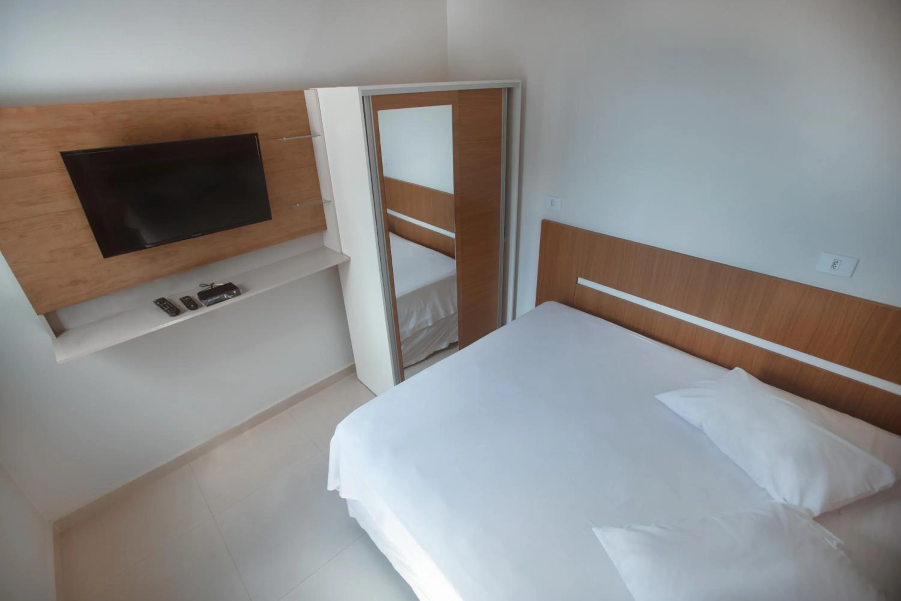 TV and multimedia, Bed in Souza Reis Apart - Unidade 1