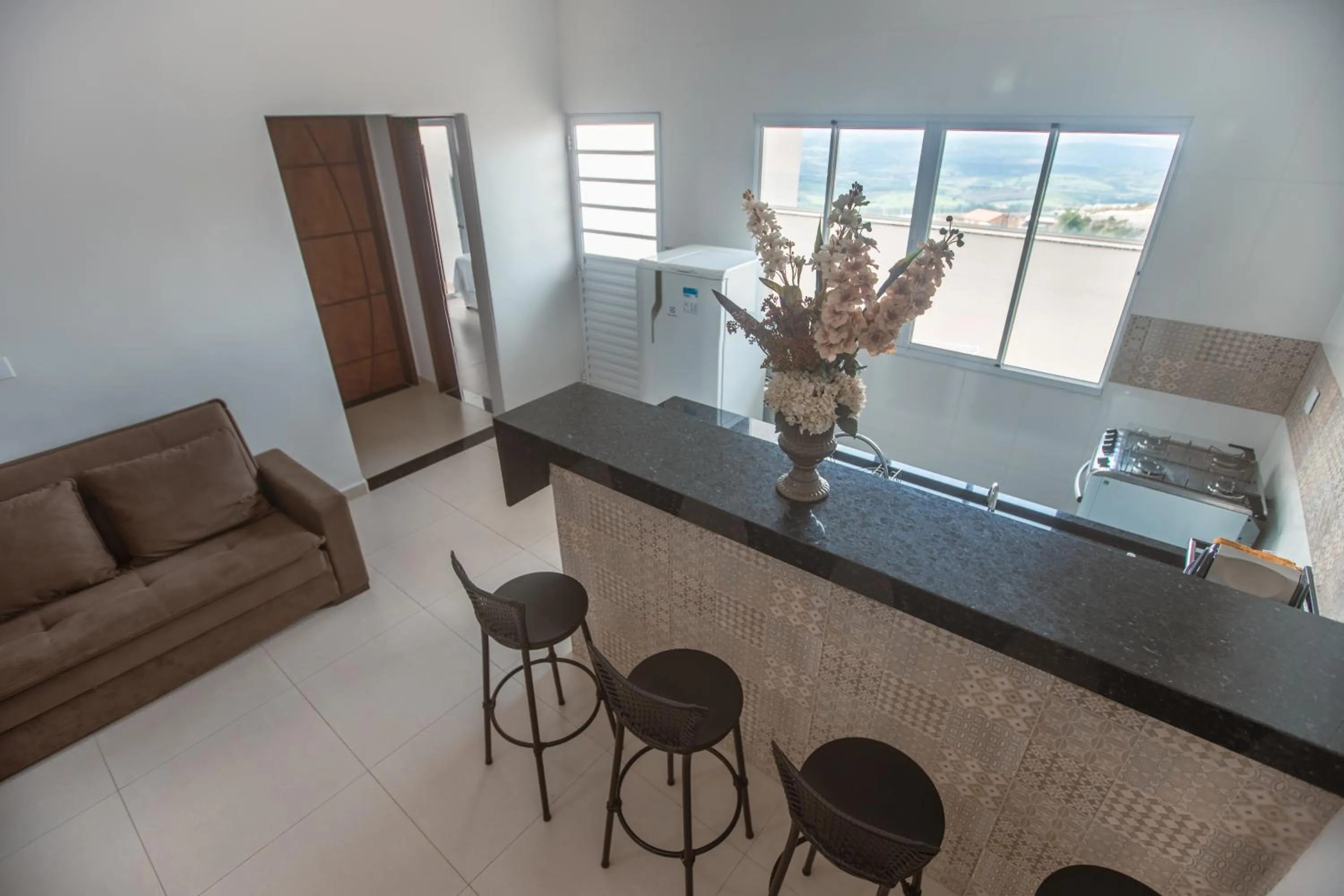 Communal kitchen in Souza Reis Apart - Unidade 1